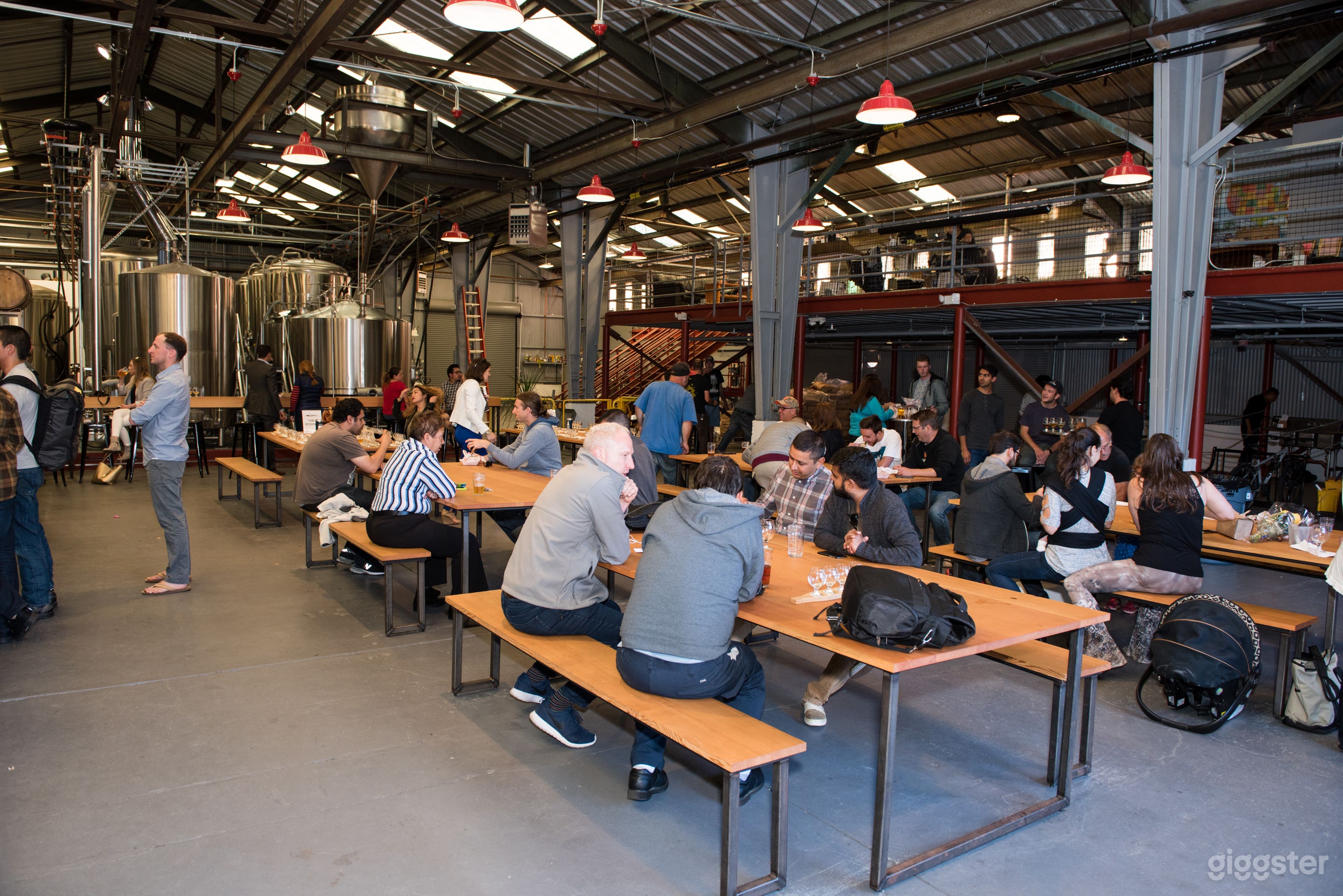 Tasting room with equipment in the background.