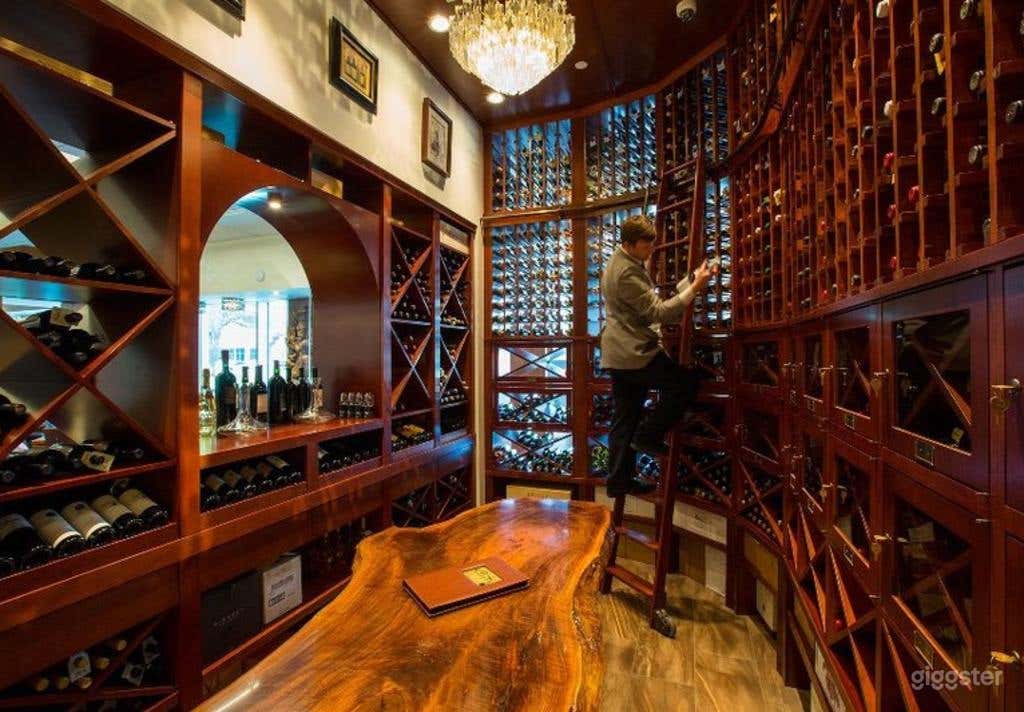 Cozy Dining Room with Polo-themed Paintings in Houston Photo 4