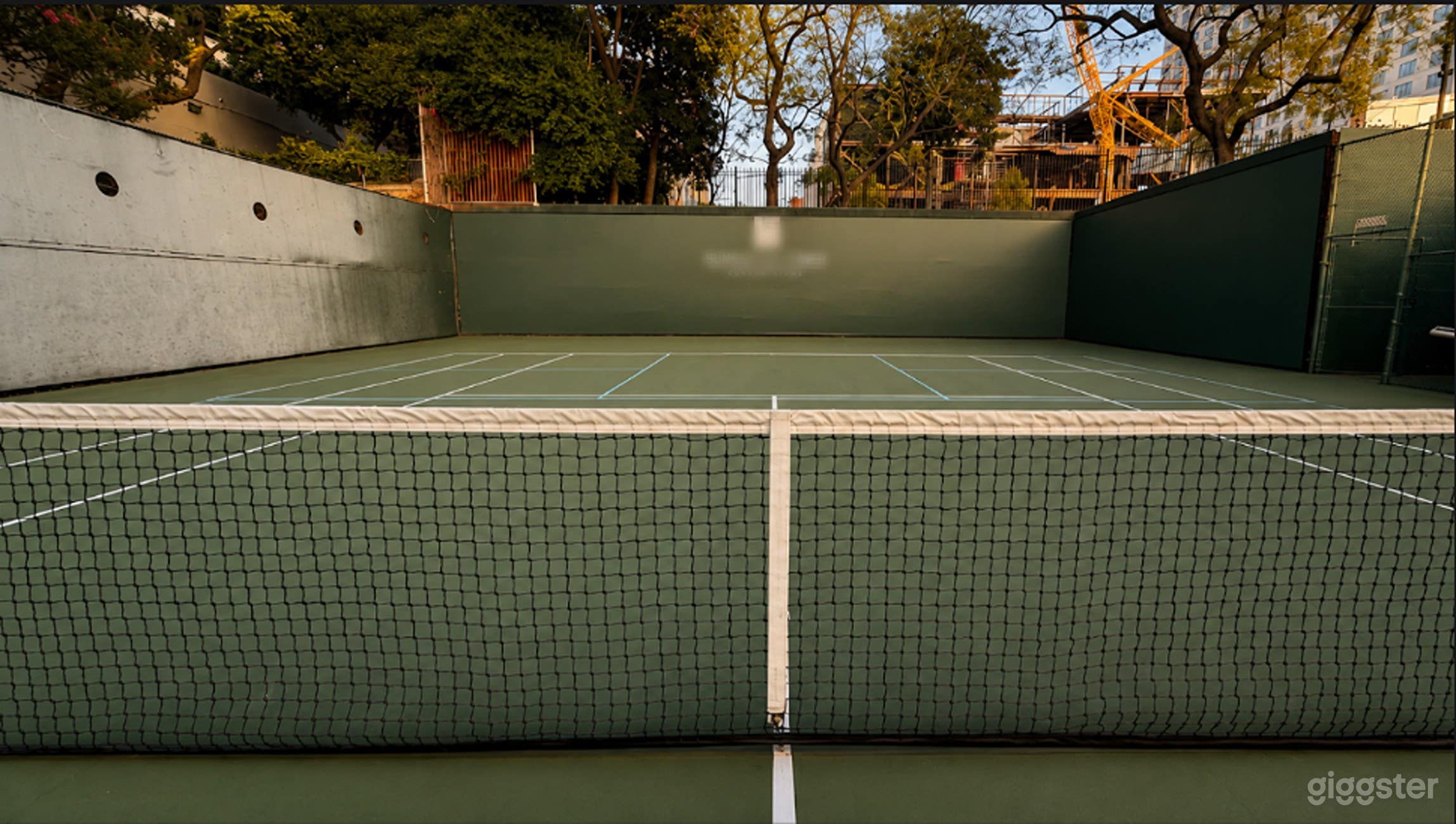 Private Luxury Tennis Court with Cinematic DTLA Skyline Photo 1