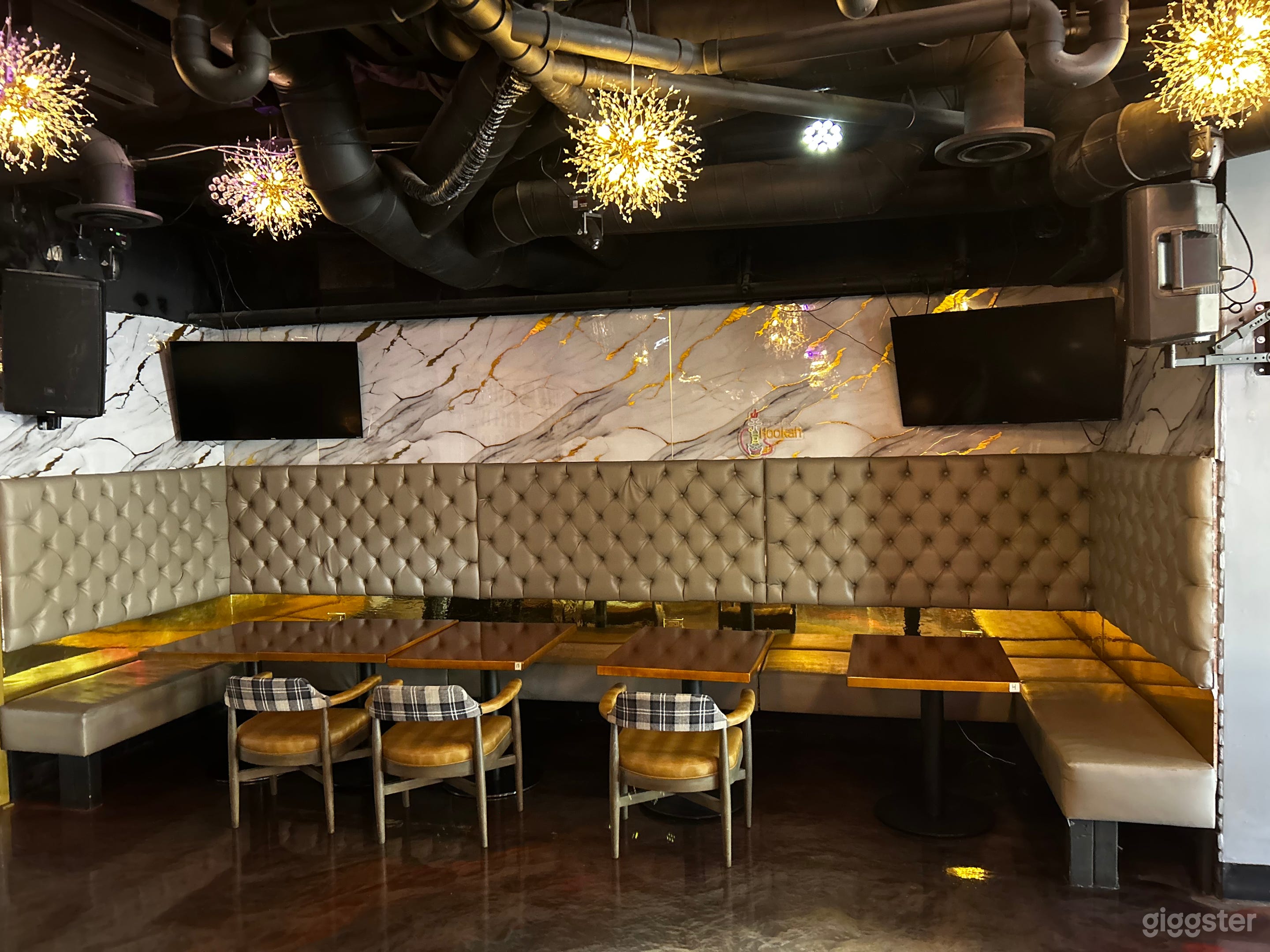 Modern Two-Story Nightclub with Rooftop Bar Photo 4