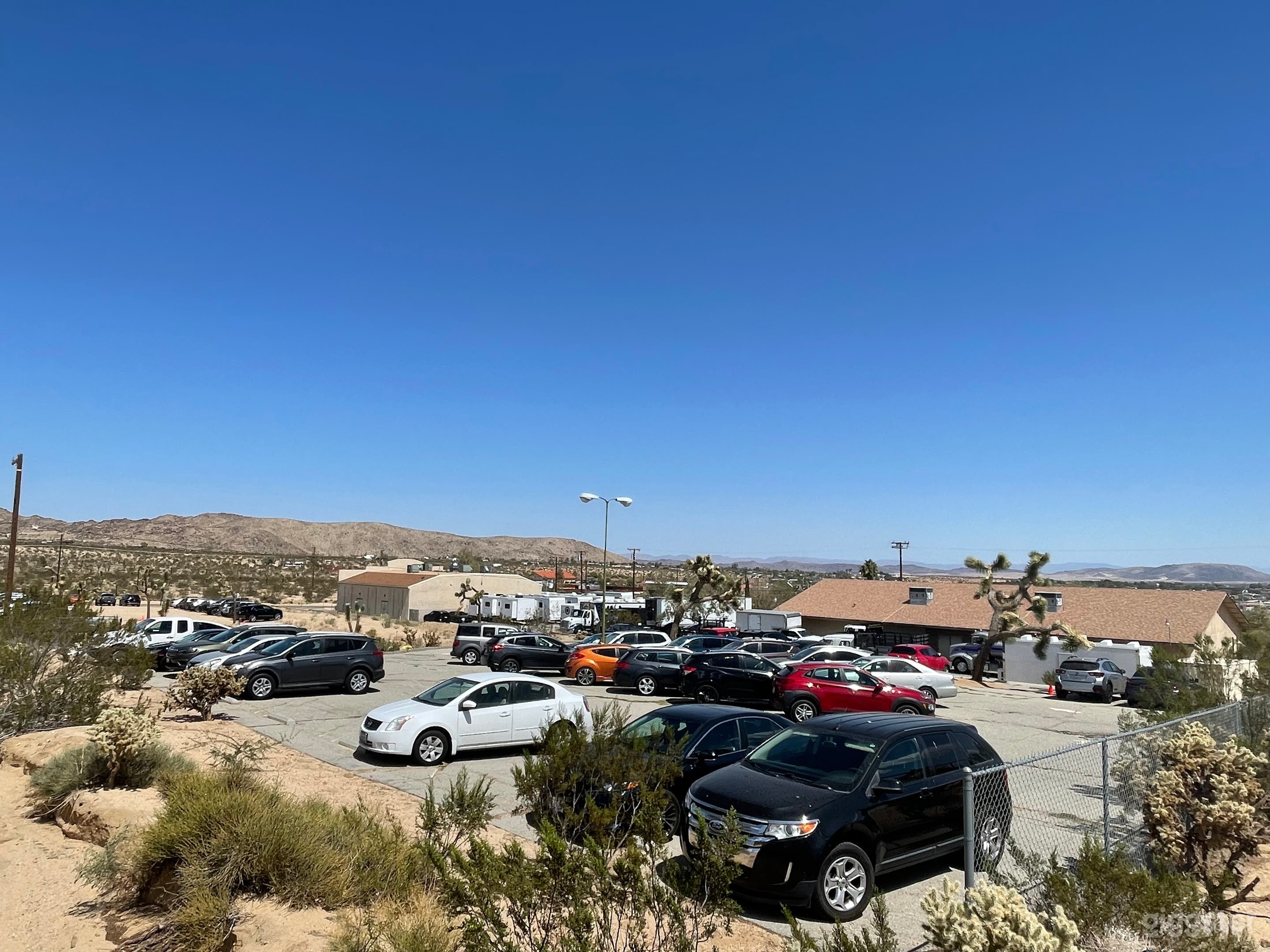 Upper paved parking area on the southwest corner of the property.