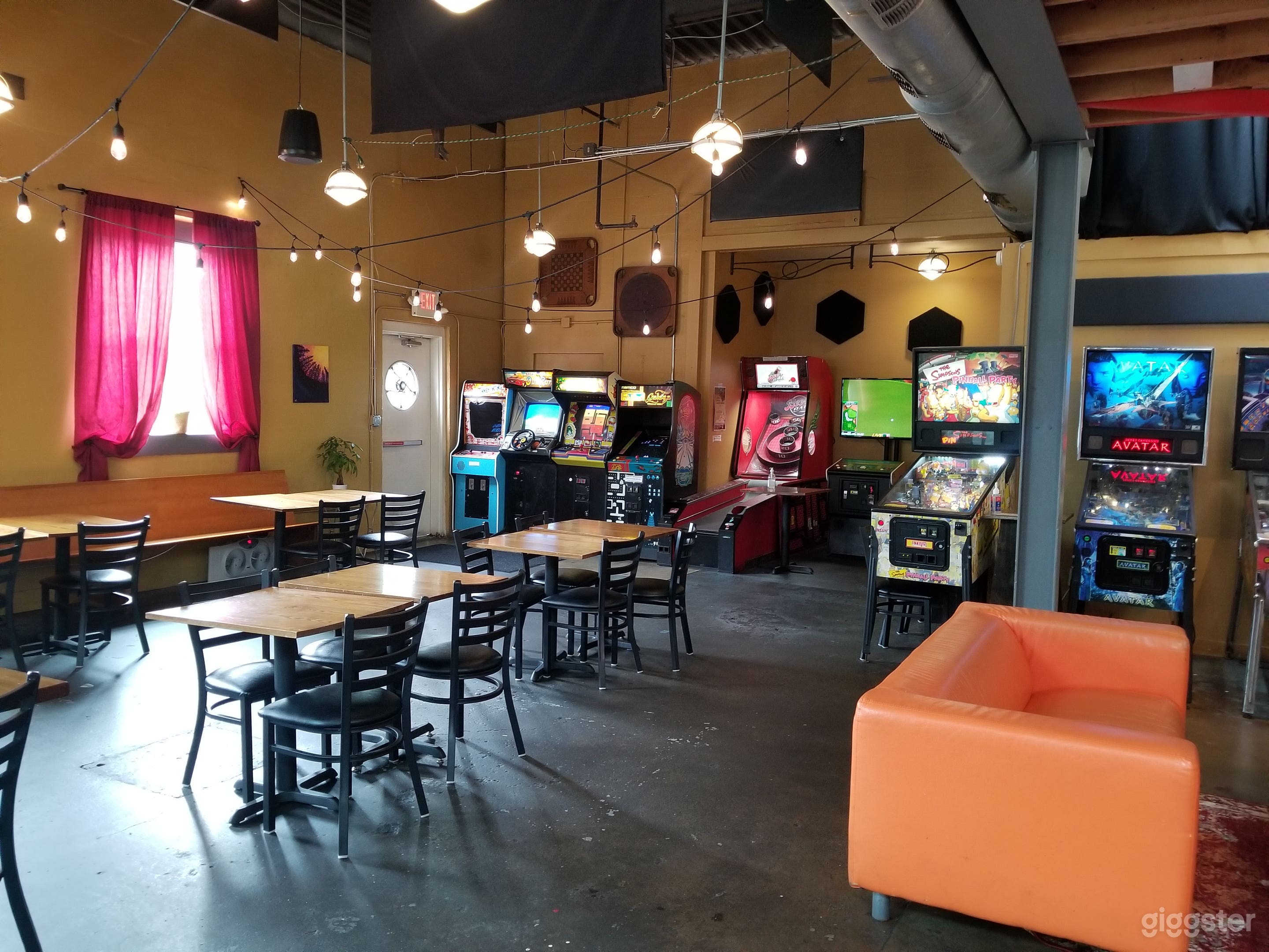 Industrial Space Turned Restaurant + Game Room Photo 1