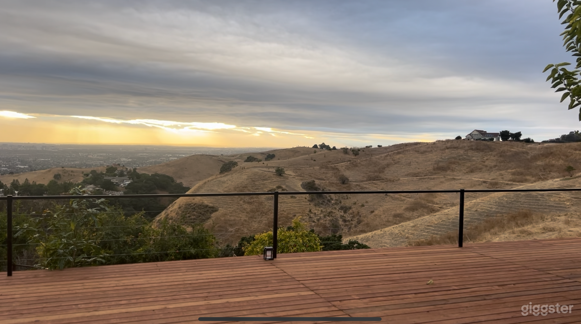 Our 3000 sq ft deck leading out onto a 2500 sq ft large grassy bluff. Both areas are used for a multi-tier celebration space. Both areas have a wonderful view of Downtown San Jose.