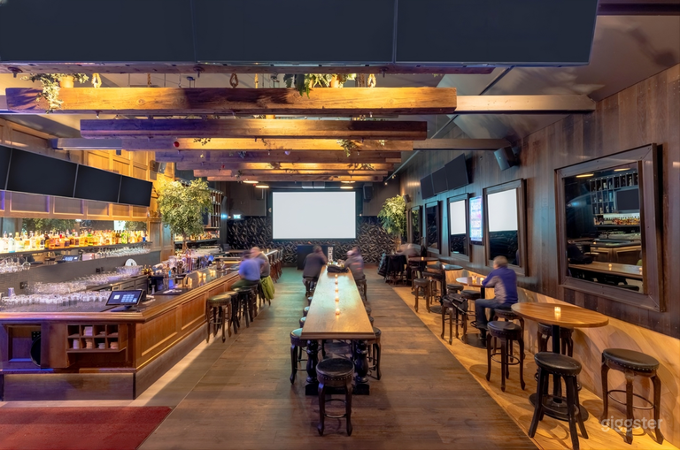  Main floor with dance floor, dining, bar and a 16‑ft project 