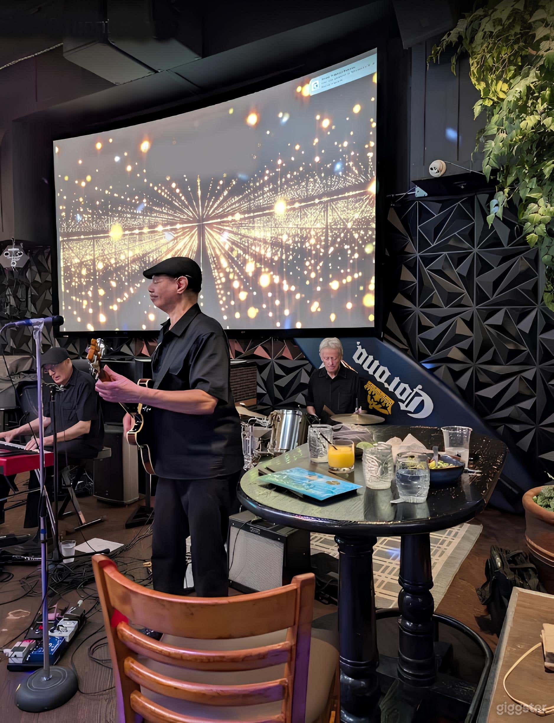 Main floor with dance floor, dining, bar and a 16‑ft project Photo 4