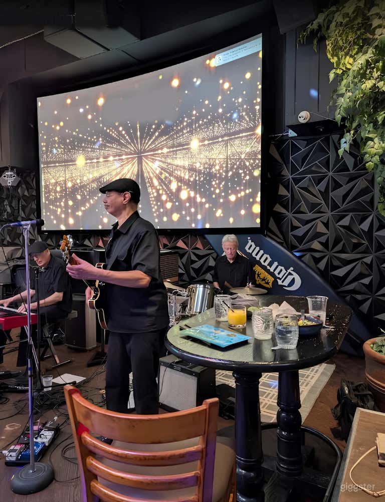  Main floor with dance floor, dining, bar and a 16‑ft project 