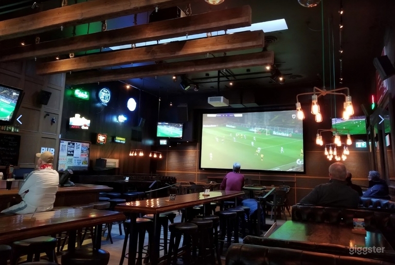  Main floor with dance floor, dining, bar and a 16‑ft project 