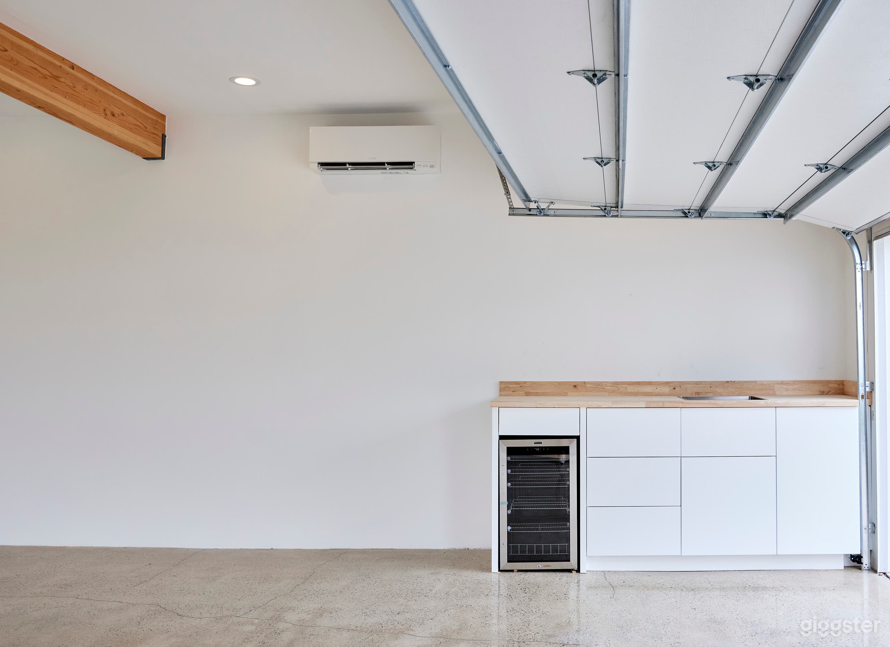 Airy Industrial Polished Concrete +WoodBeam Studio Photo 4