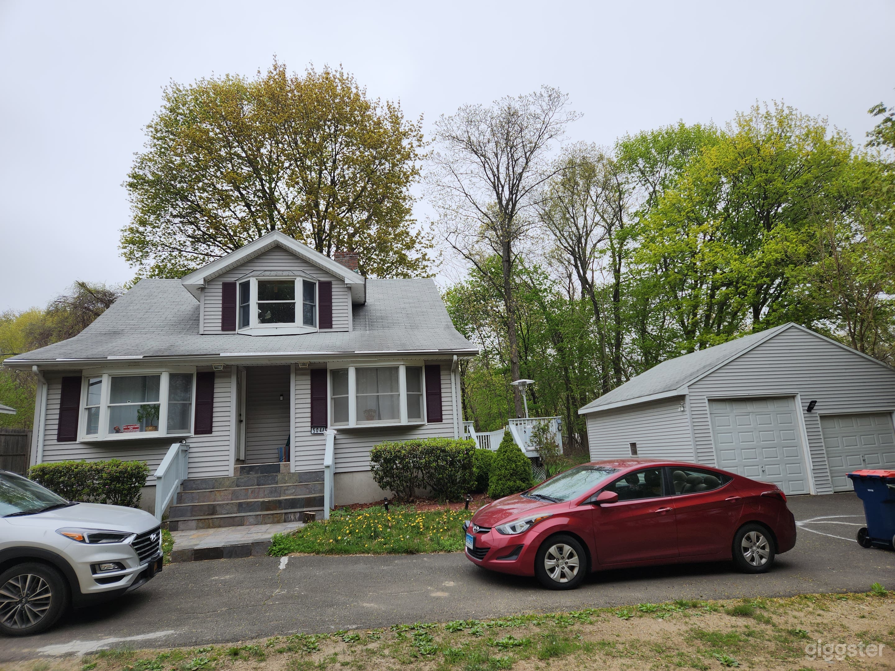 House with yard and garage. 