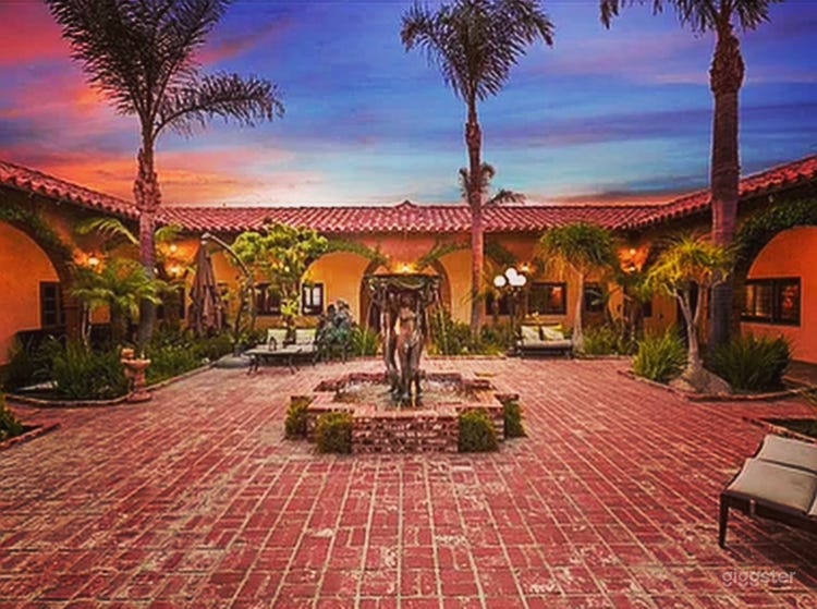 Spanish Style Tropical Courtyard  Photo 2