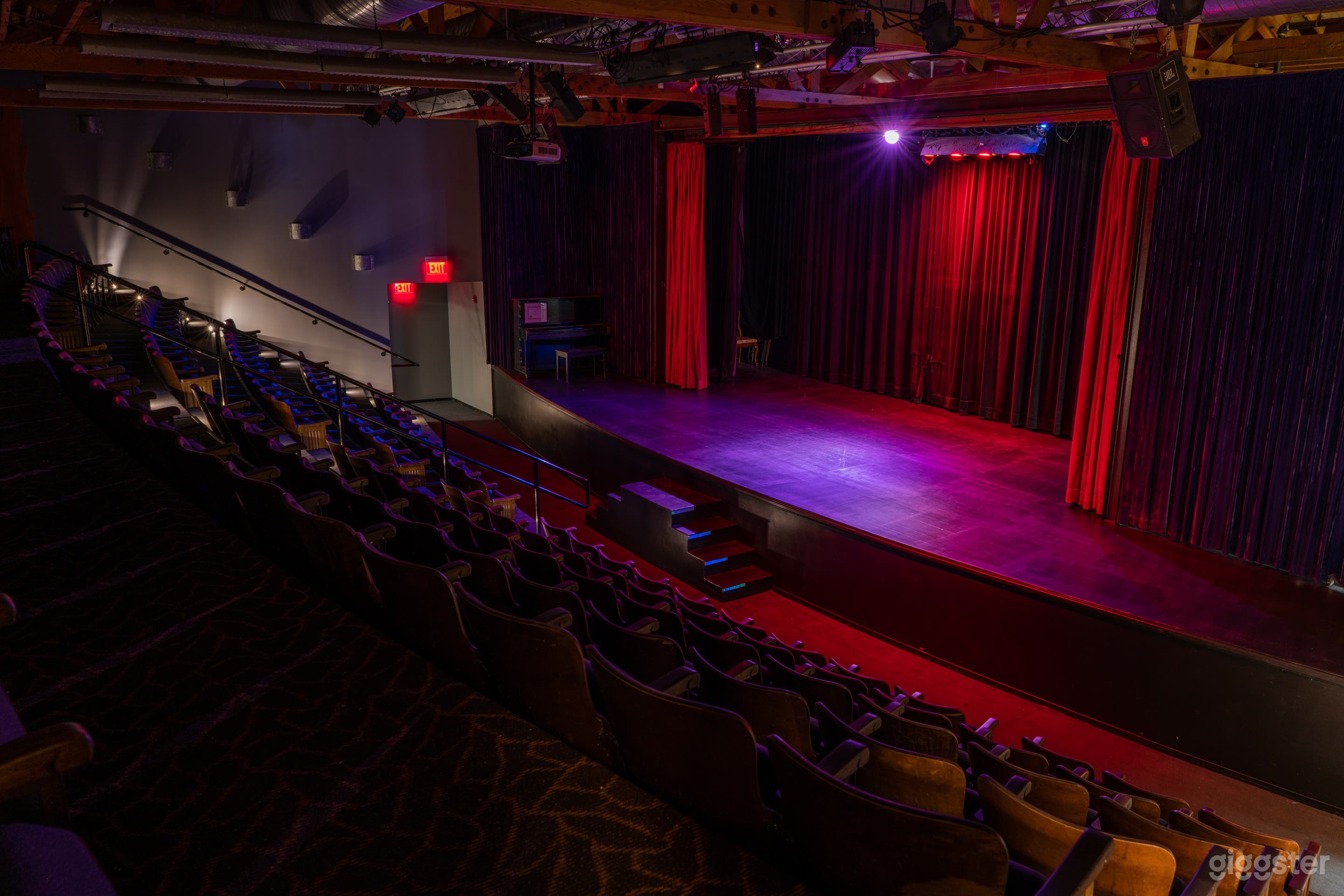 150 seat theater.  Has installed sound system, projector, and screen installed.