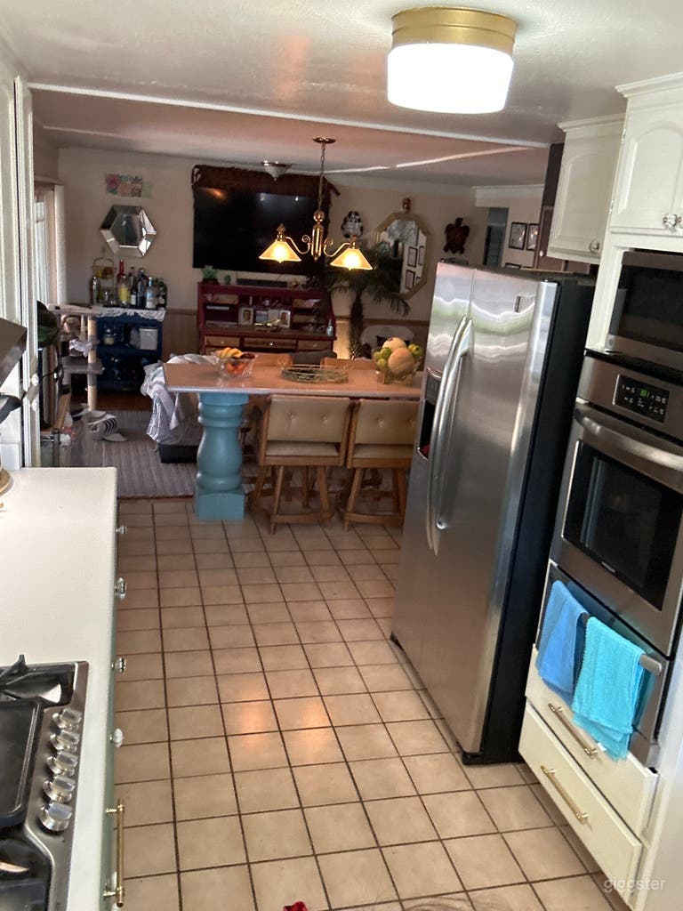  Large open kitchen with bright natural lighting.  