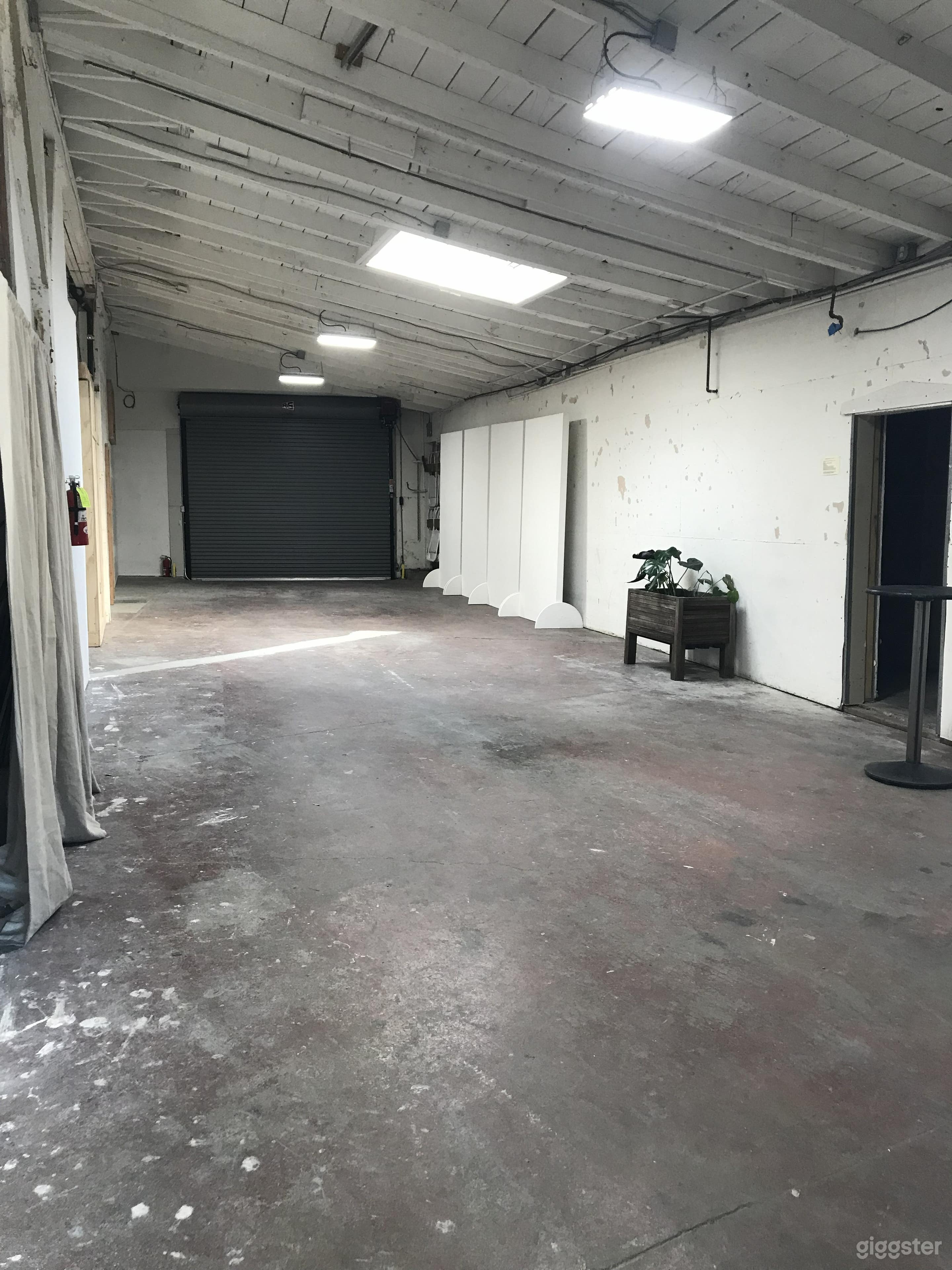Conveniently Located Warehouse w Wood Beam Ceiling Photo 2
