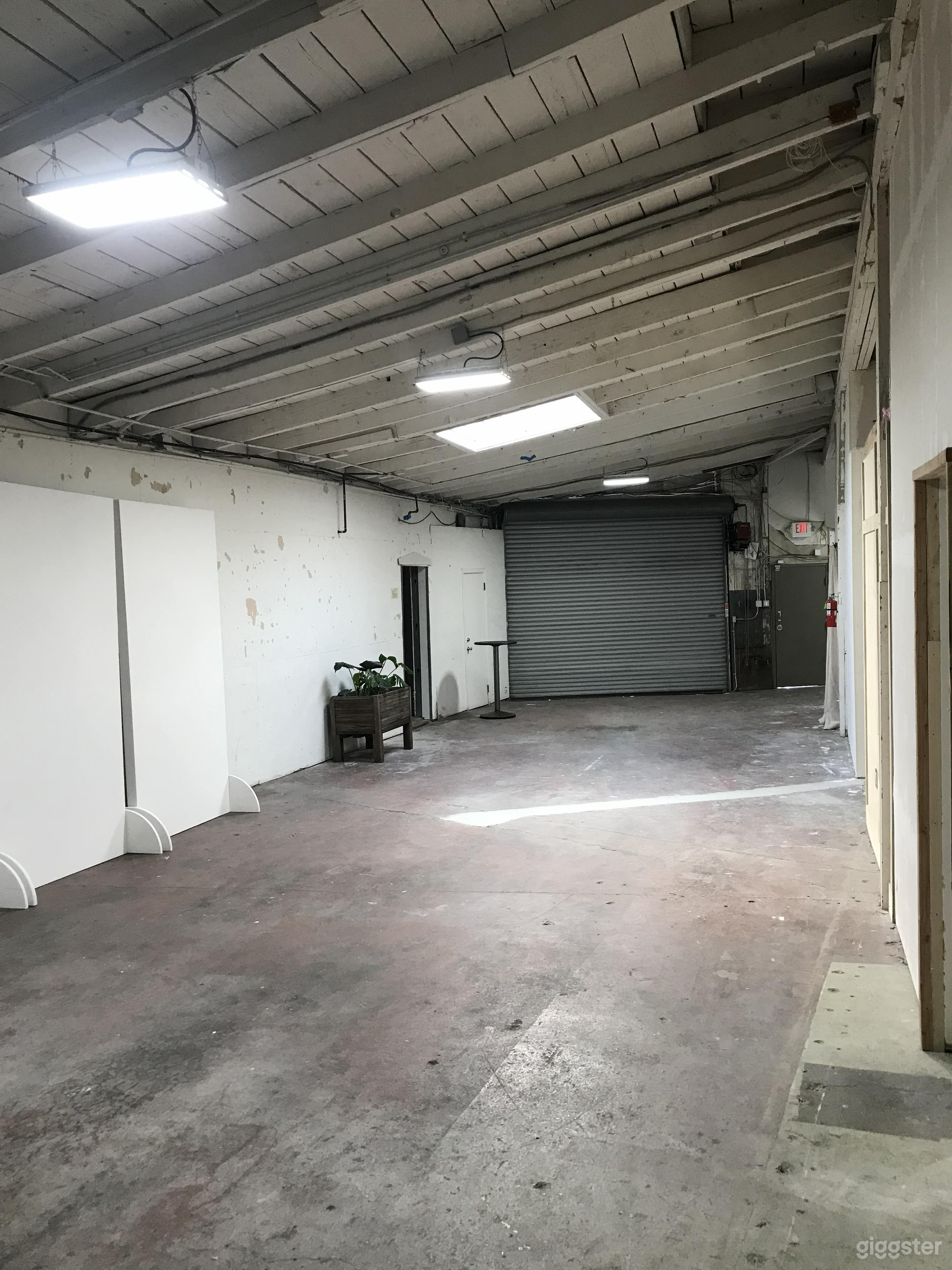 Conveniently Located Warehouse w Wood Beam Ceiling Photo 3