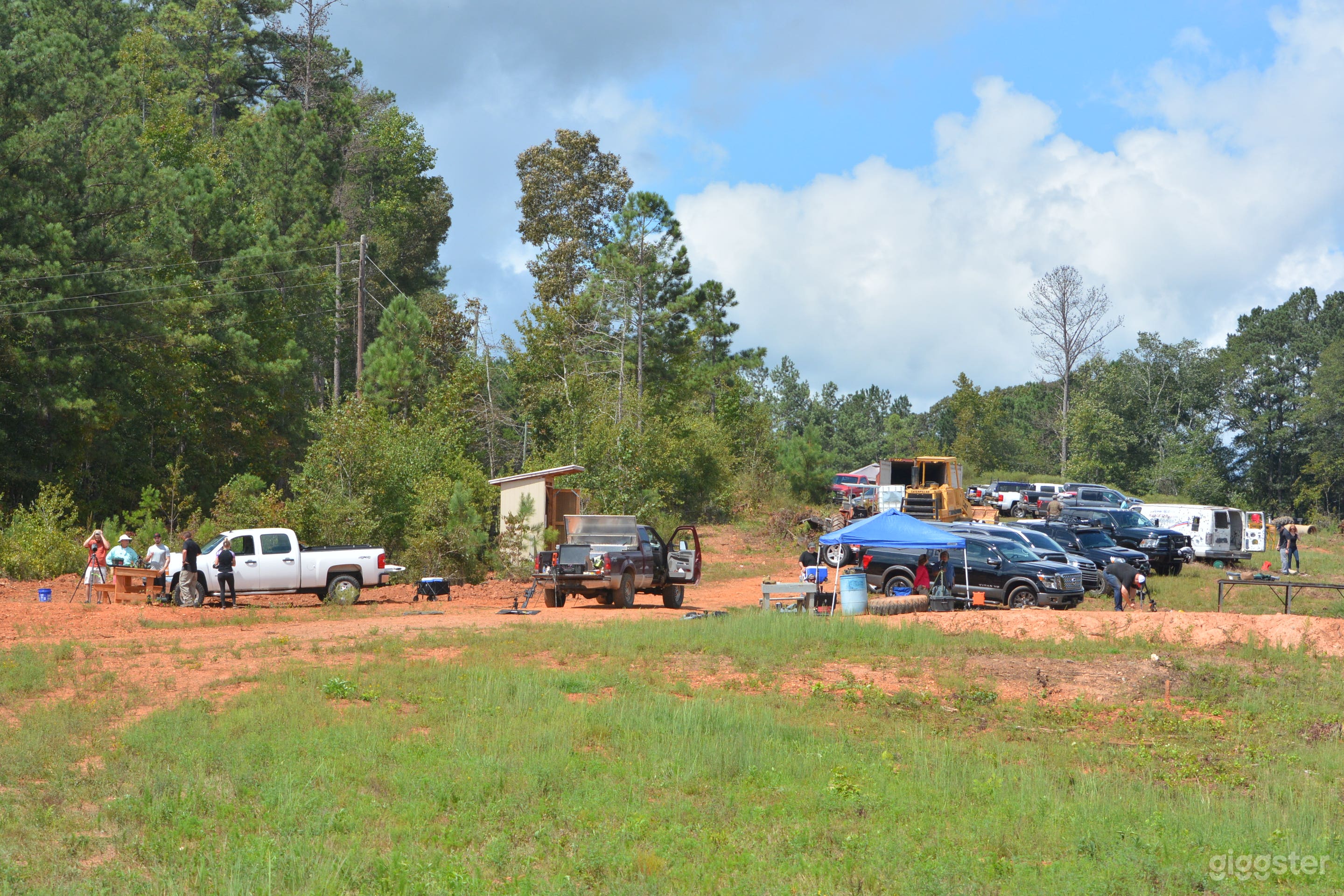 This is the 200 yard range that 50 yards wide There is now a covered metal pavilion where the white truck is. This area can accommodate several semi trucks if needed 