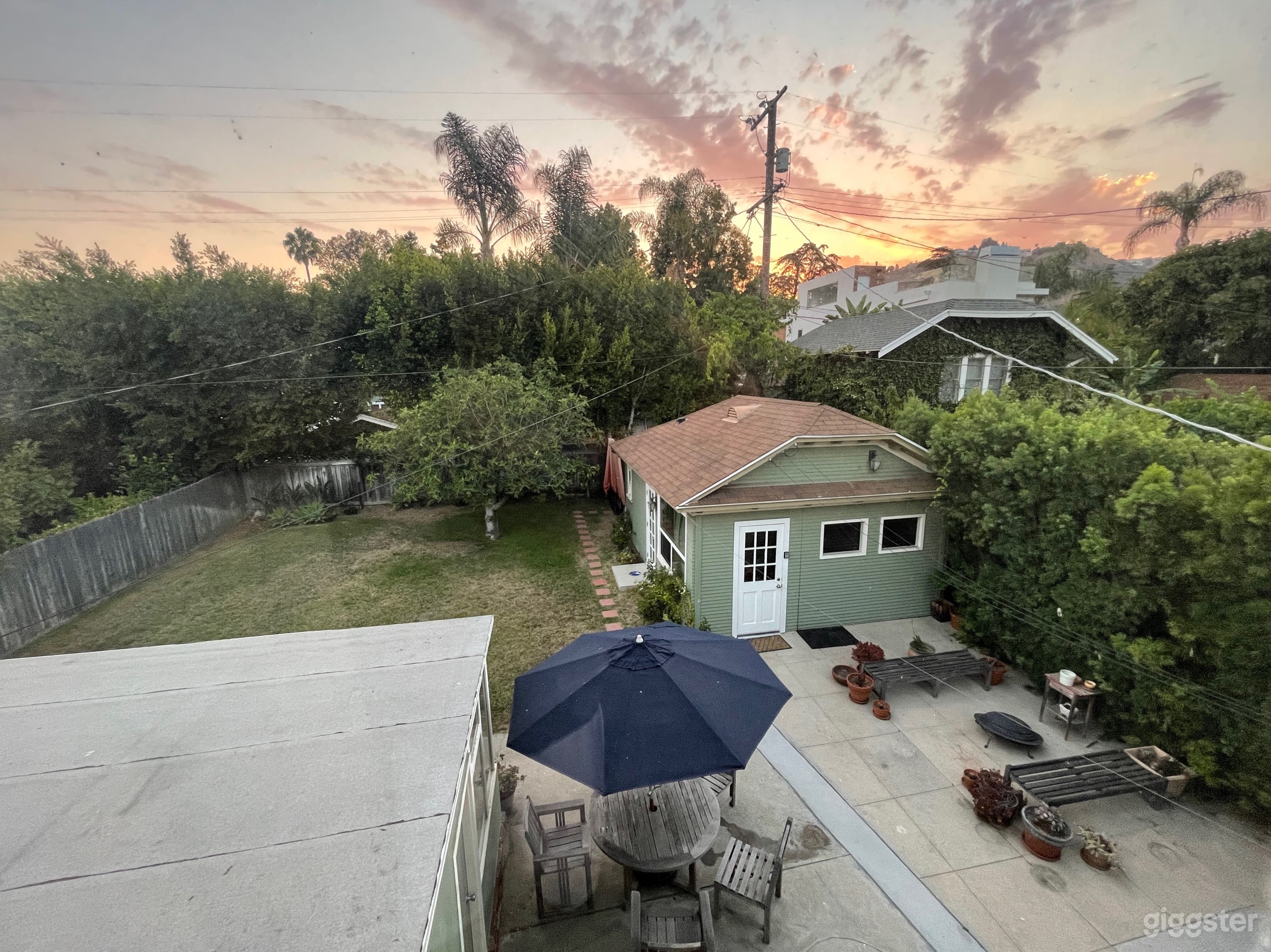 Large backyard and patio area.