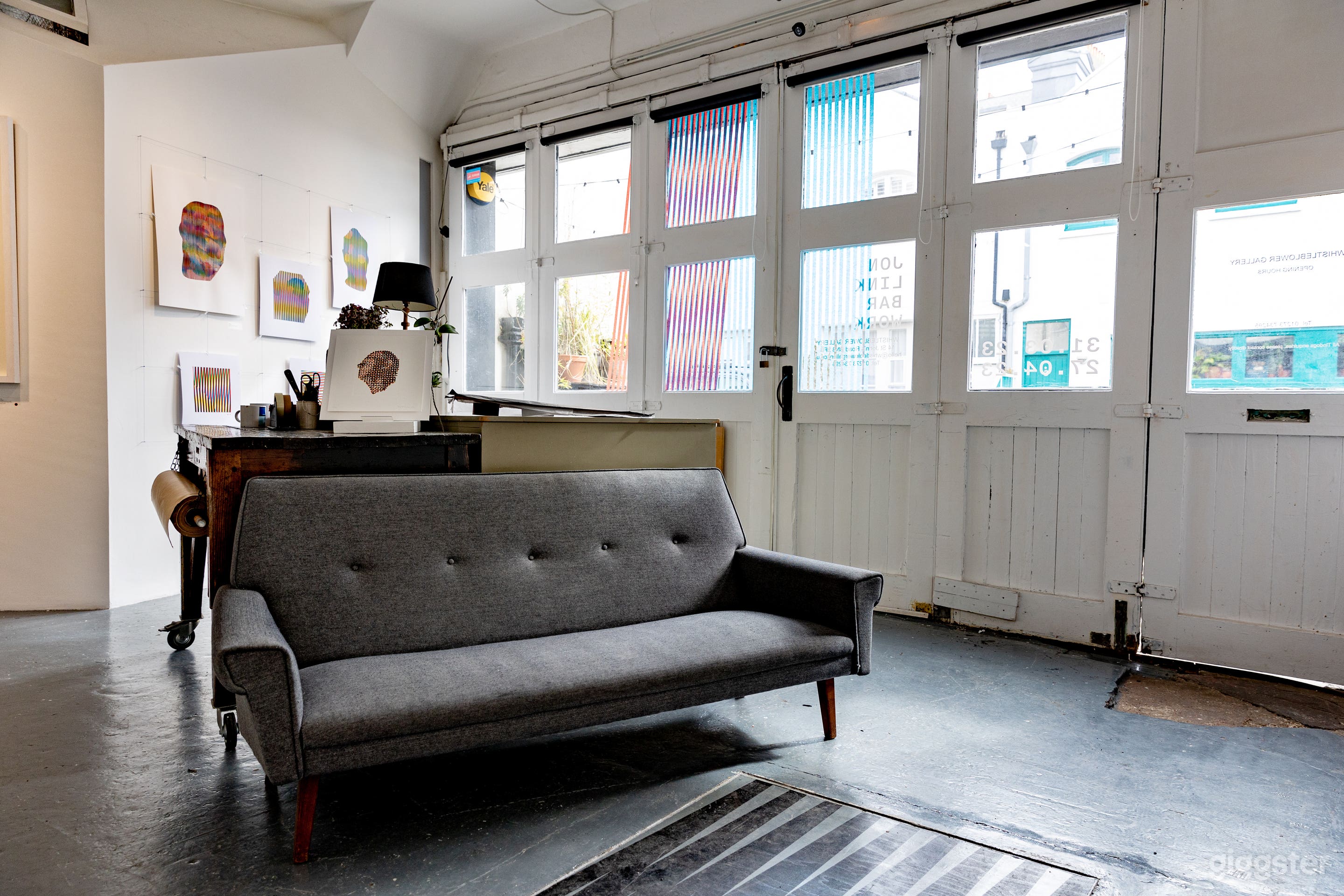 Carriage house doors that fully open from the middle outwards, or side normally functioning door.