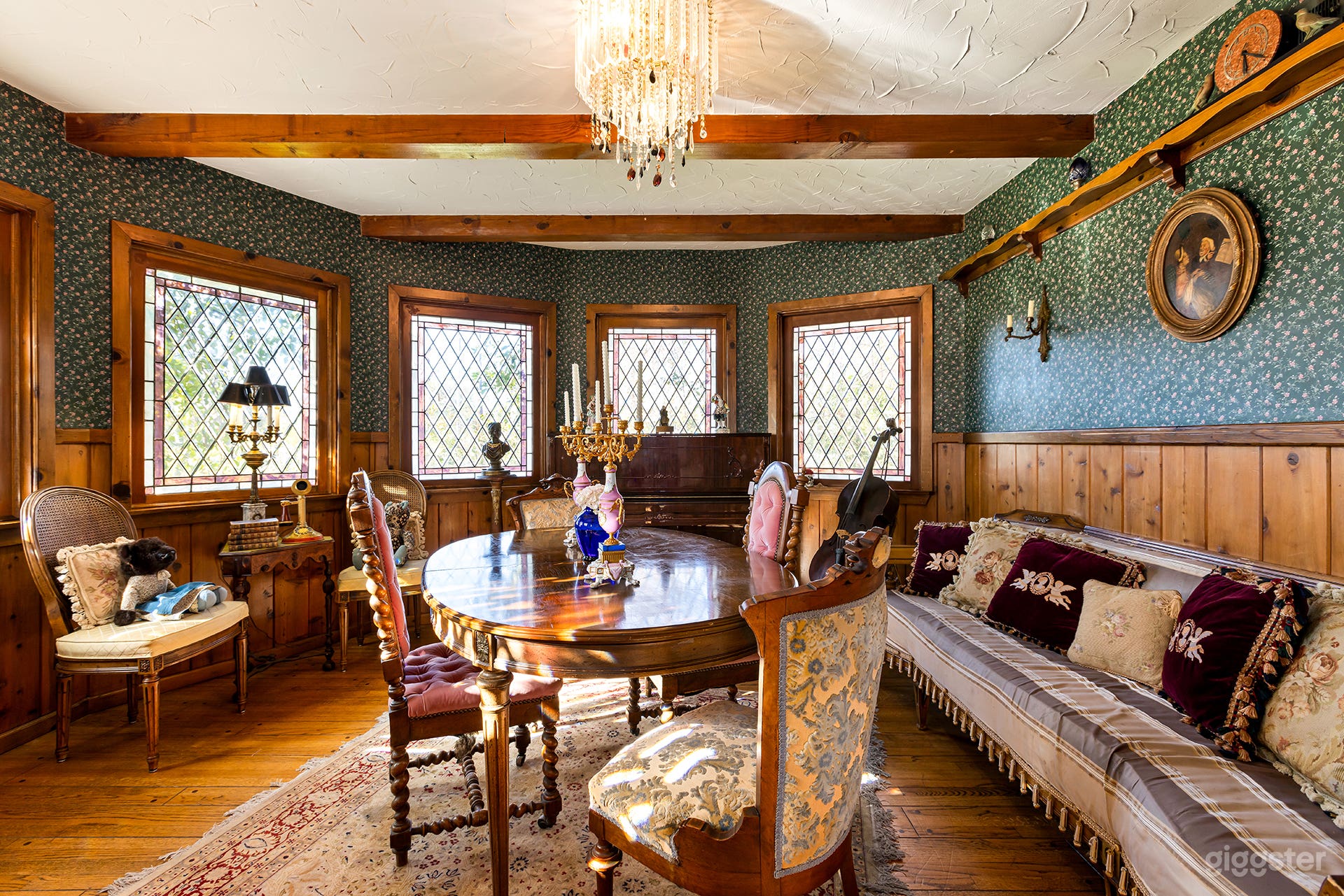 The Round Parlor Room with vintage stained-glass windows