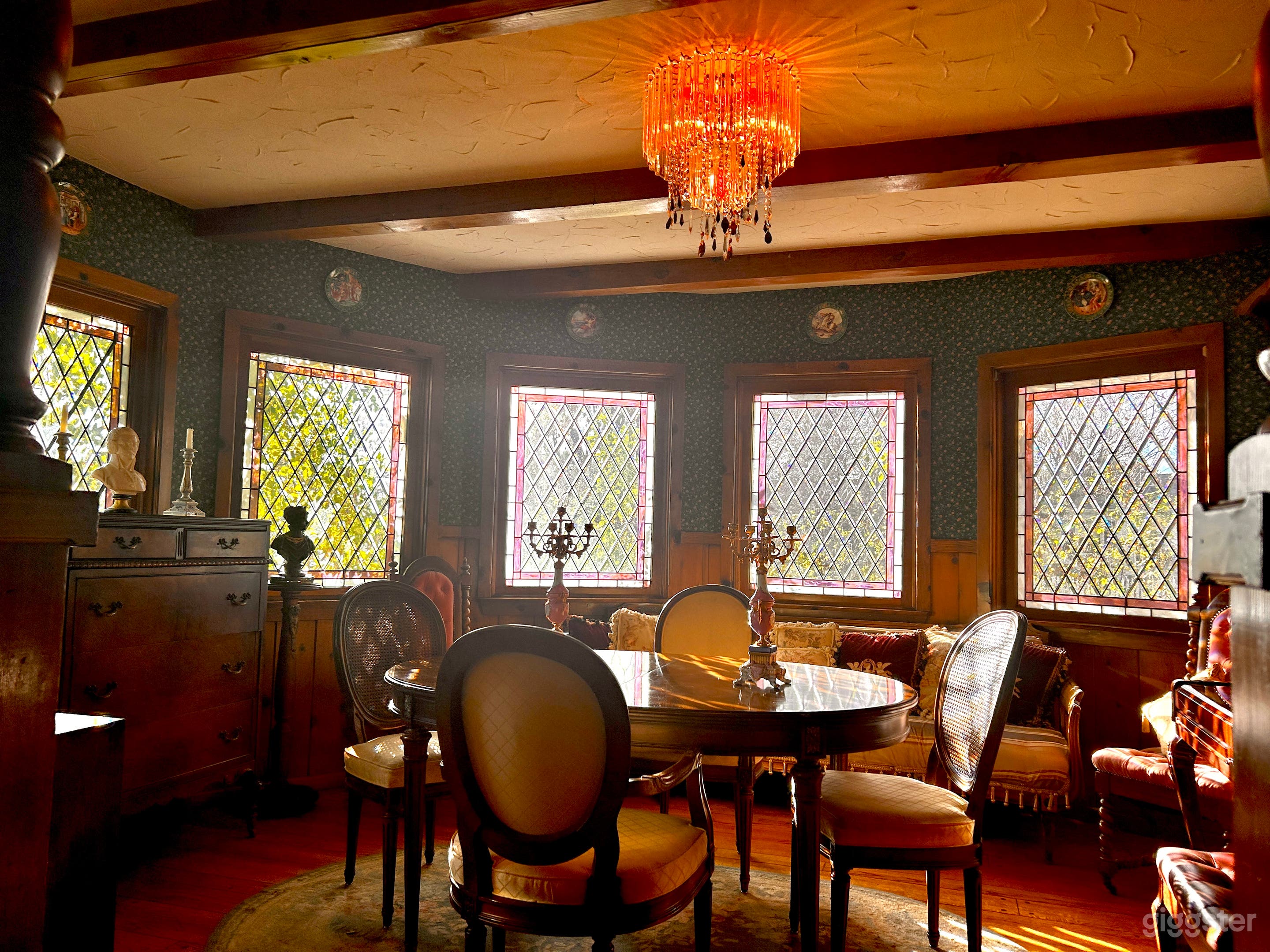 The Round Parlor room with stained glass windows