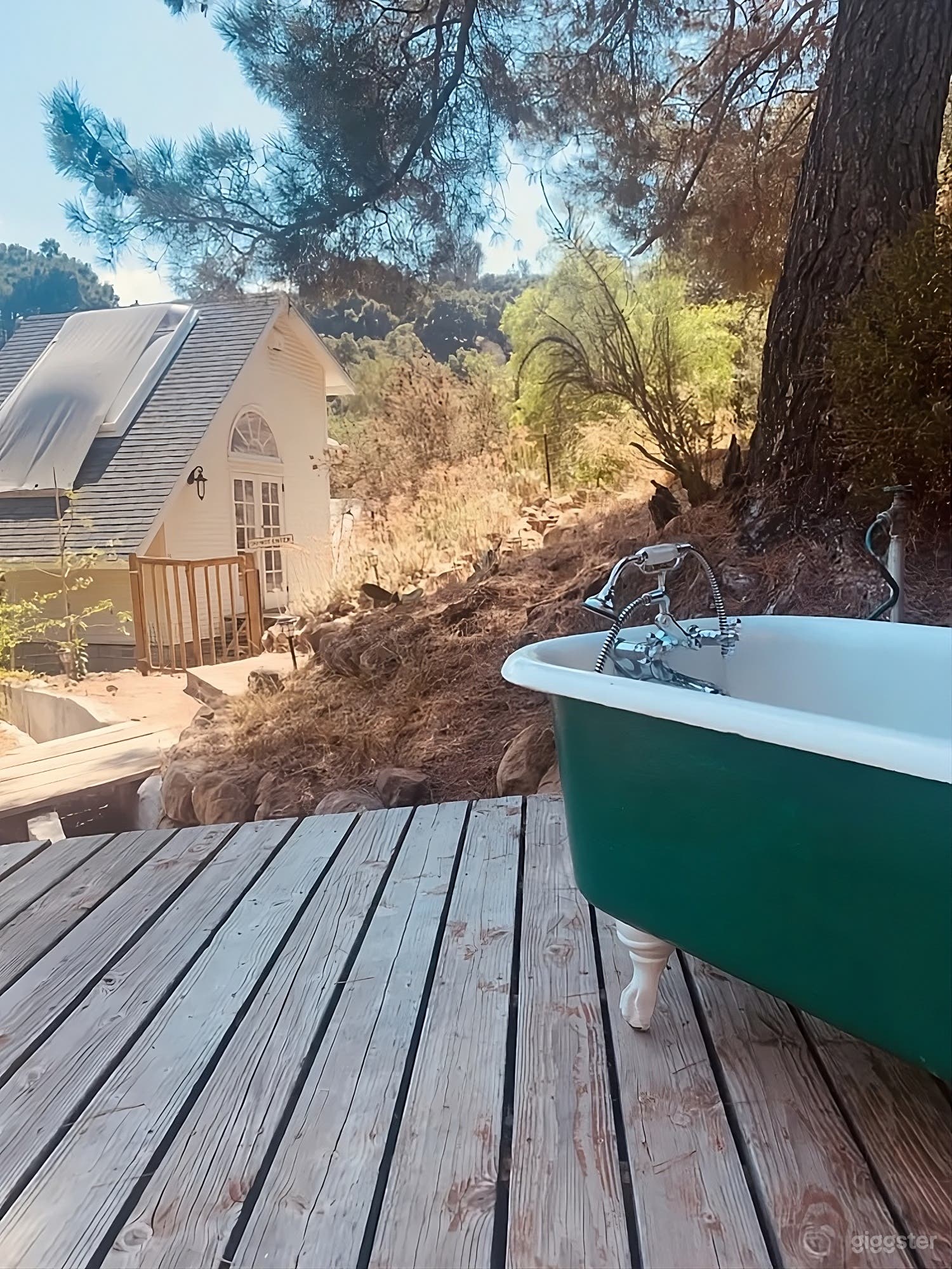 Tranquil Woodland Backyard Retreat with Outdoor Tubs Photo 3