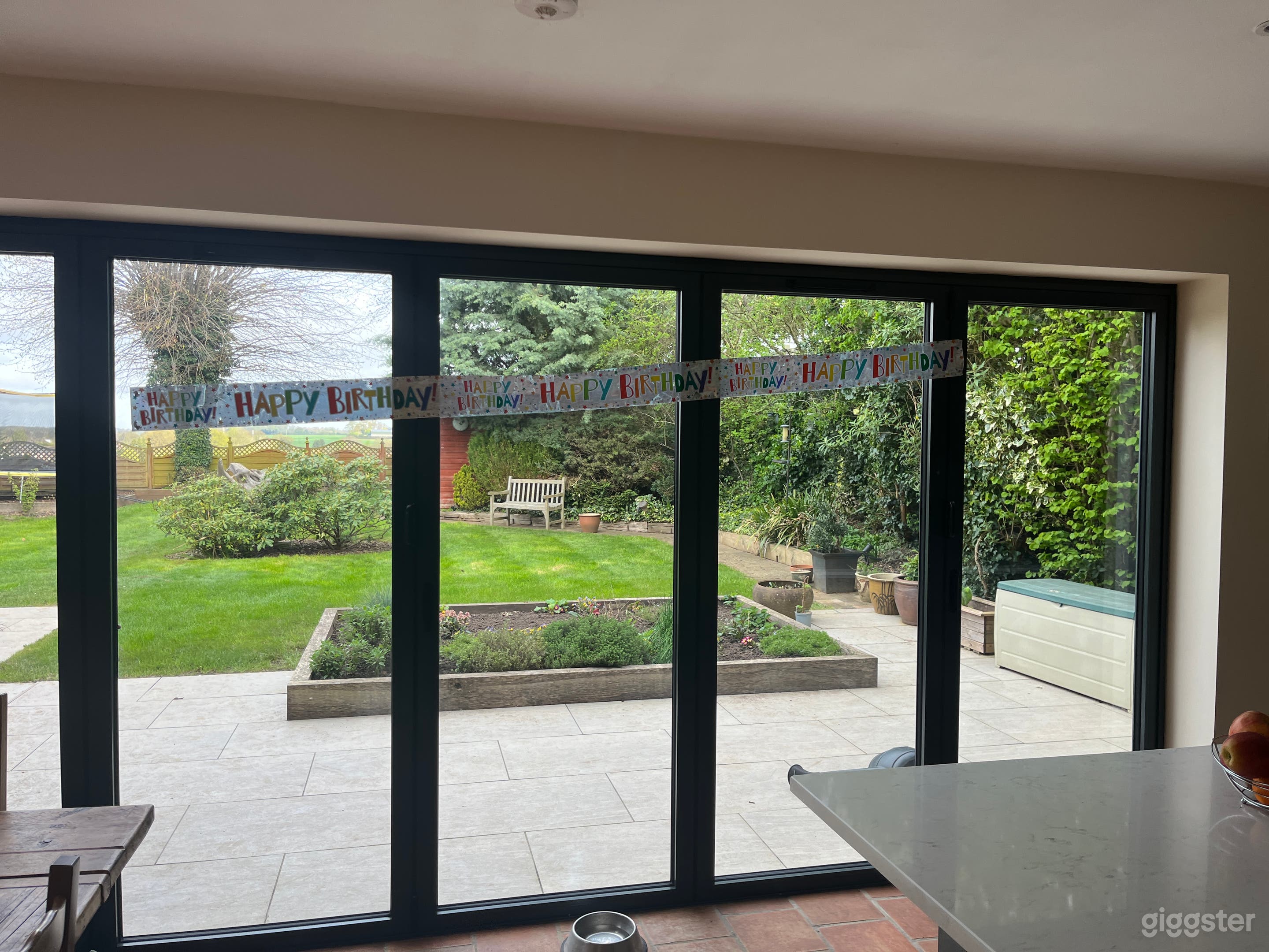 Garden overlooking fields with shed