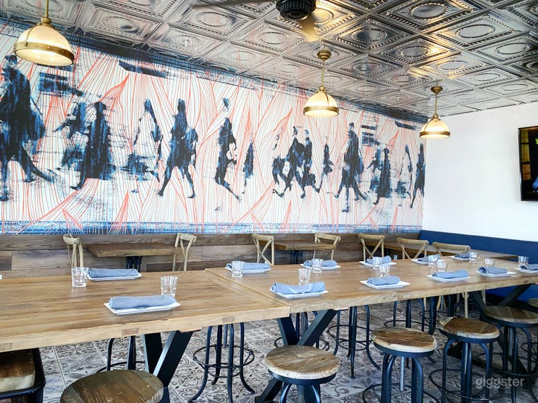  Our special Train Car Room was designed to resemble dining train cars of the past. Feel free to admire the beautiful artwork on our wall. We selected this particular piece because of the movement it conveys and the color combination is a perfect expression 