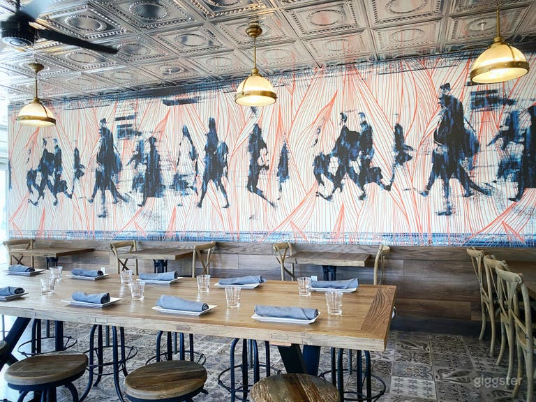  Our special Train Car Room was designed to resemble dining train cars of the past. Feel free to admire the beautiful artwork on our wall. We selected this particular piece because of the movement it conveys and the color combination is a perfect expression 