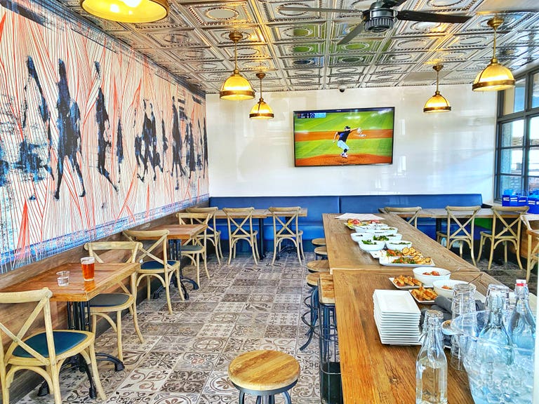  Our special Train Car Room was designed to resemble dining train cars of the past. Feel free to admire the beautiful artwork on our wall. We selected this particular piece because of the movement it conveys and the color combination is a perfect expression 