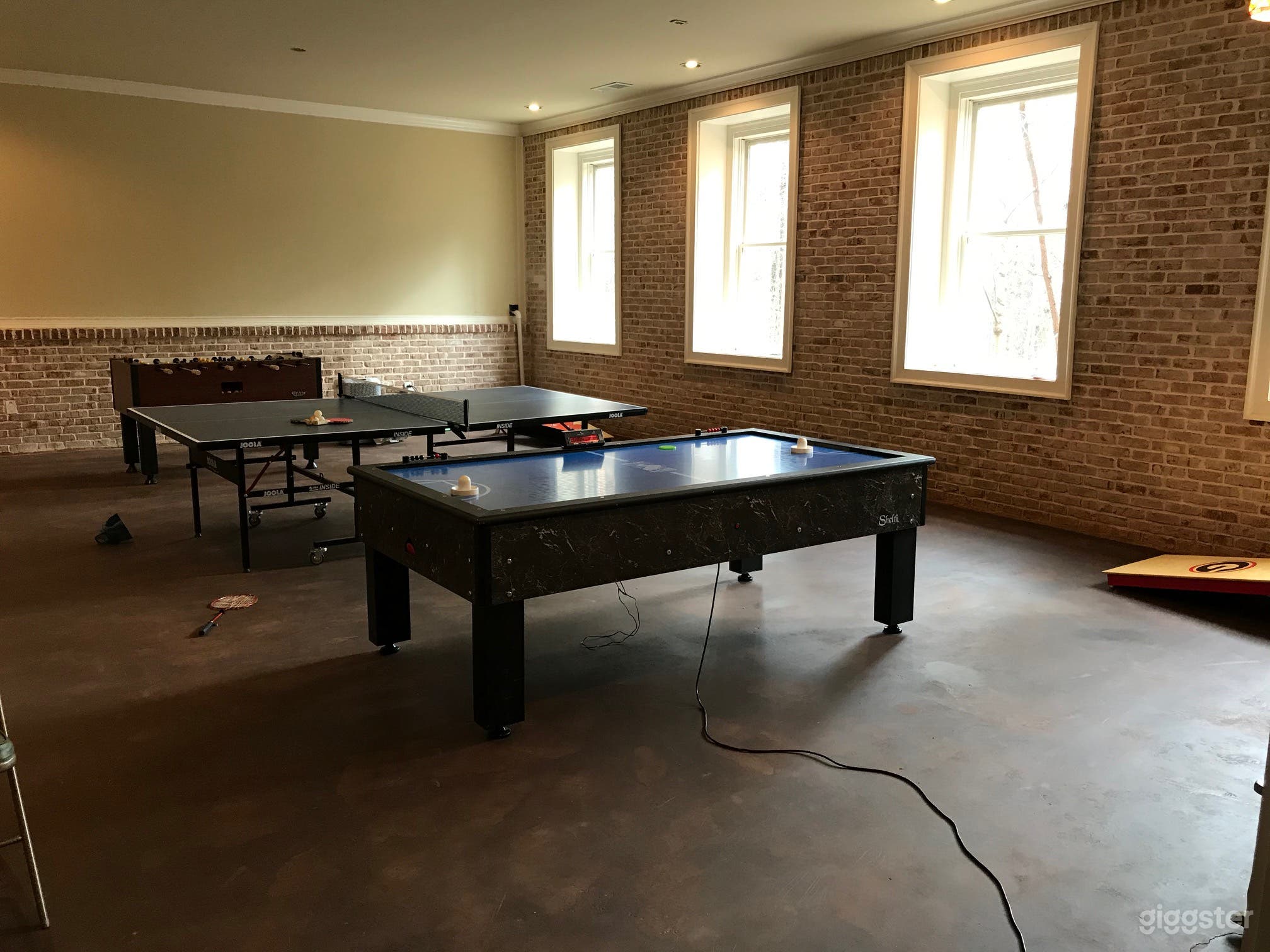 Deep bay windows overlooking private wooded area
