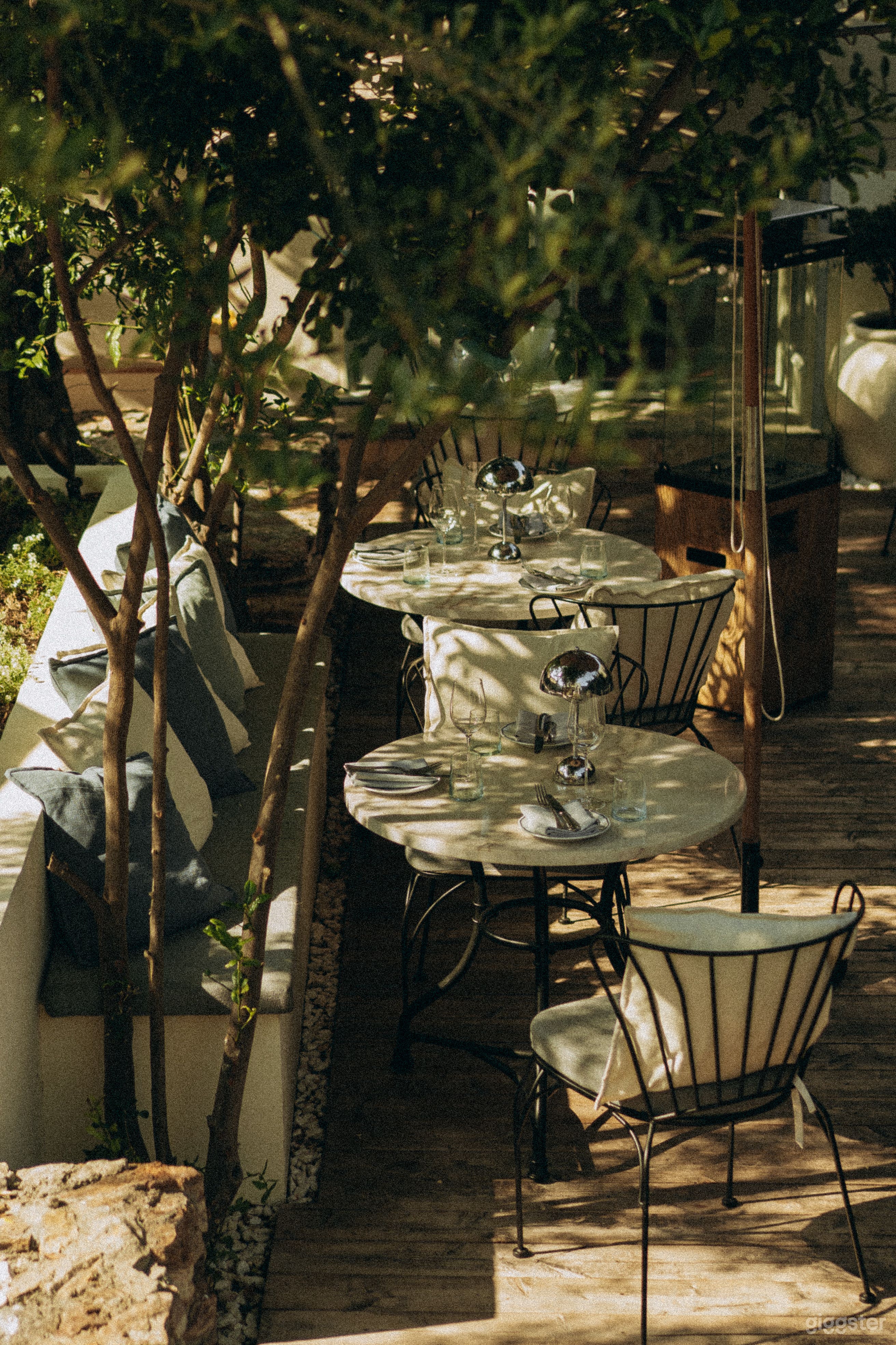 Mediterranean Restaurant with Lush Patio & Sunlight Photo 3
