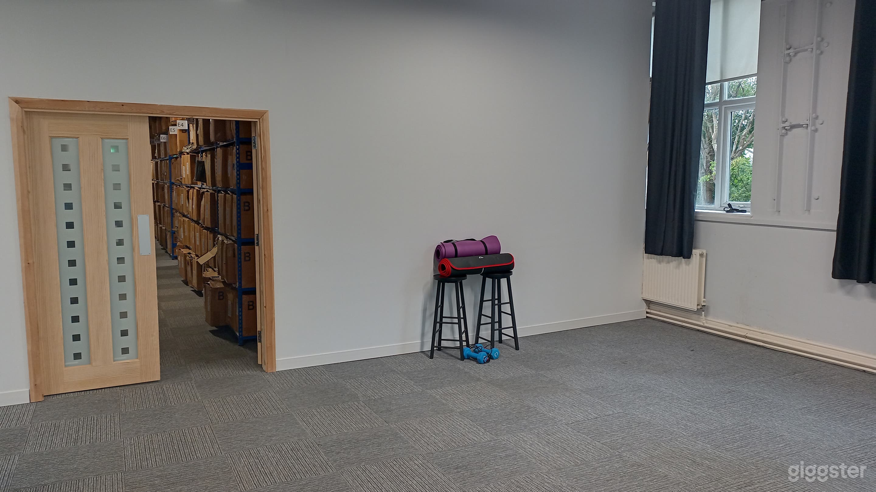 Natural light, ceiling lights and additional free standing photo shoot lighting