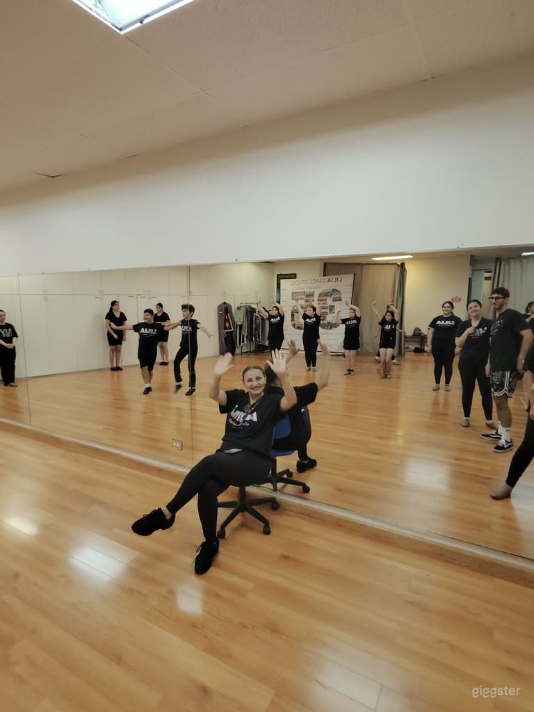  Open Dance Studio with Mirrors + Wood Floors 