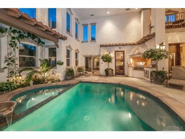 Spanish Mission Style Mansion With Lake View Photo 4