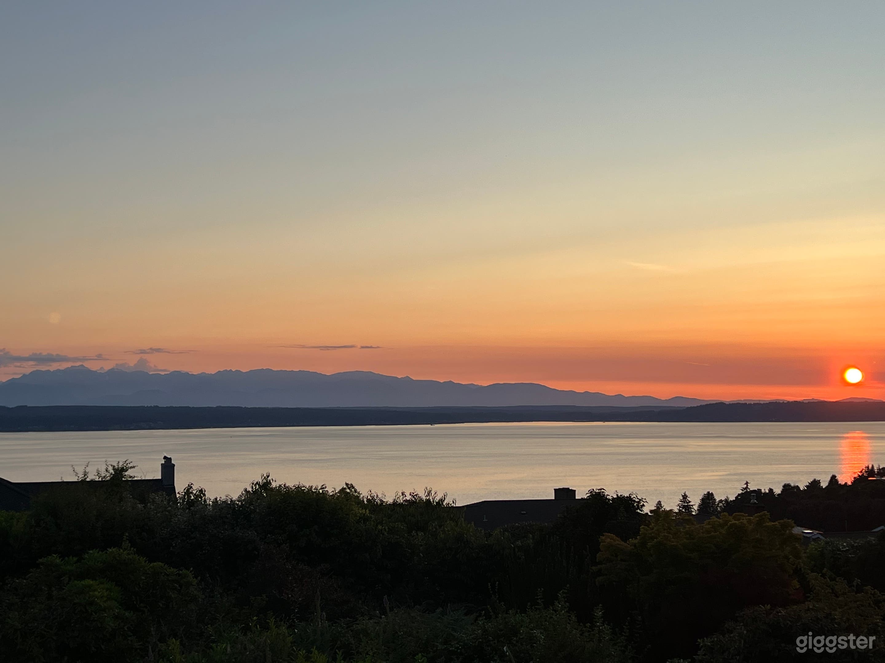 View from living room, kitchen and covered deck.