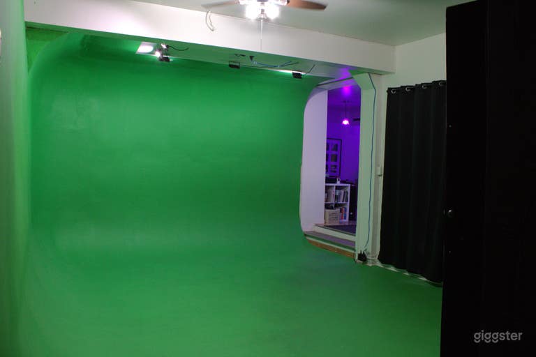  Green screen cyclorama with dedicated LED ceiling lighting and blackout curtains, leading to lounge area with app-controlled lighting 