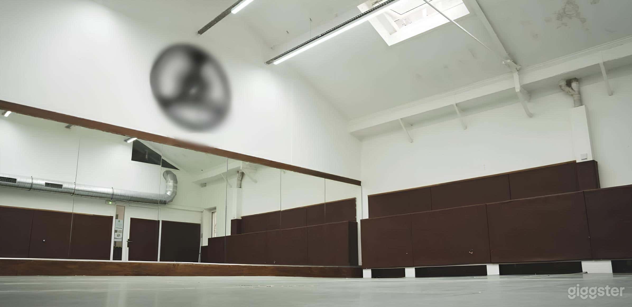 Spacious Gym with Concrete Flooring Photo 1