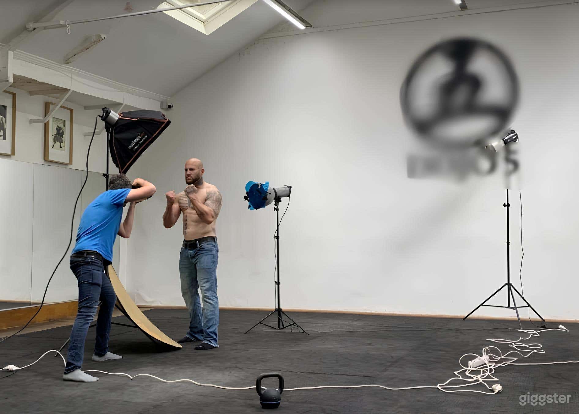 Spacious Gym with Concrete Flooring Photo 2