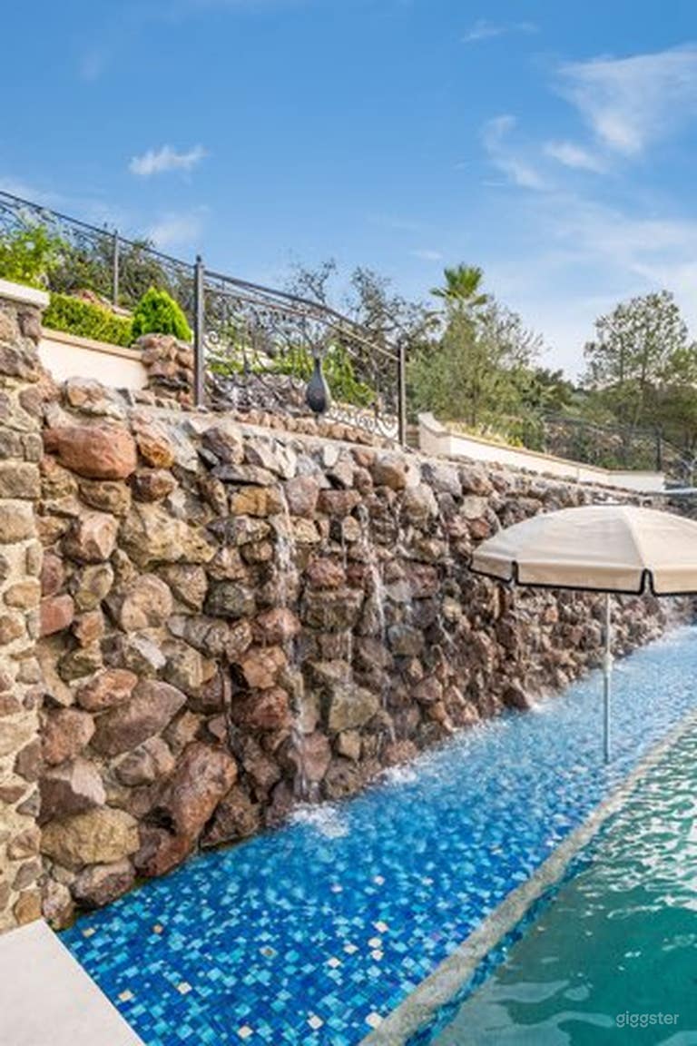  An extravagant pool at a French Chateau Style Mansion 