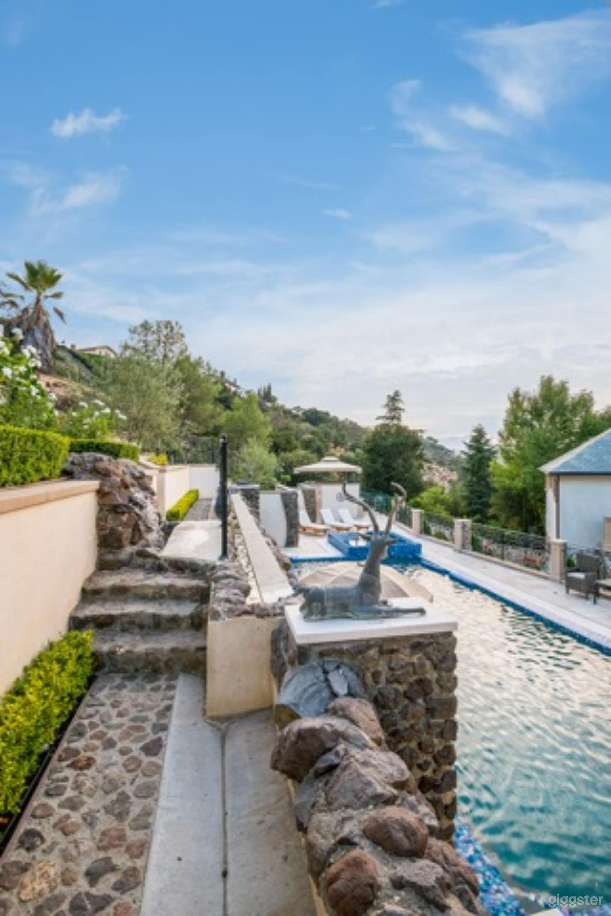 An extravagant pool at a French Chateau Style Mansion Photo 3