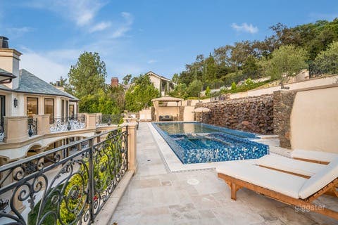  An extravagant pool at a French Chateau Style Mansion 