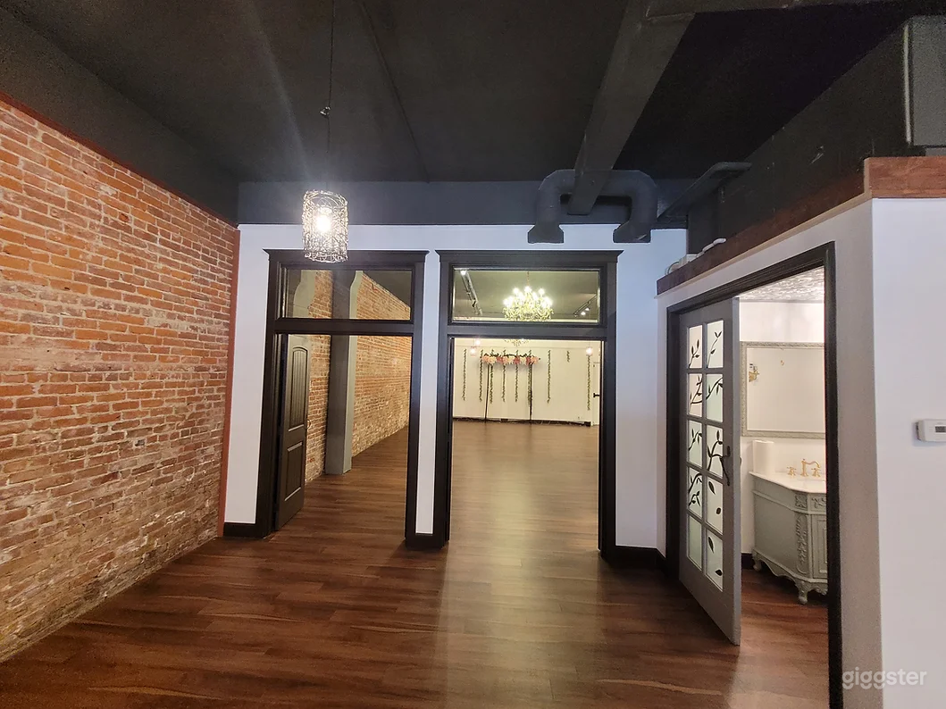 Our Venue has 2 large rooms. the back is our ballroom area with 2 large chandeliers.