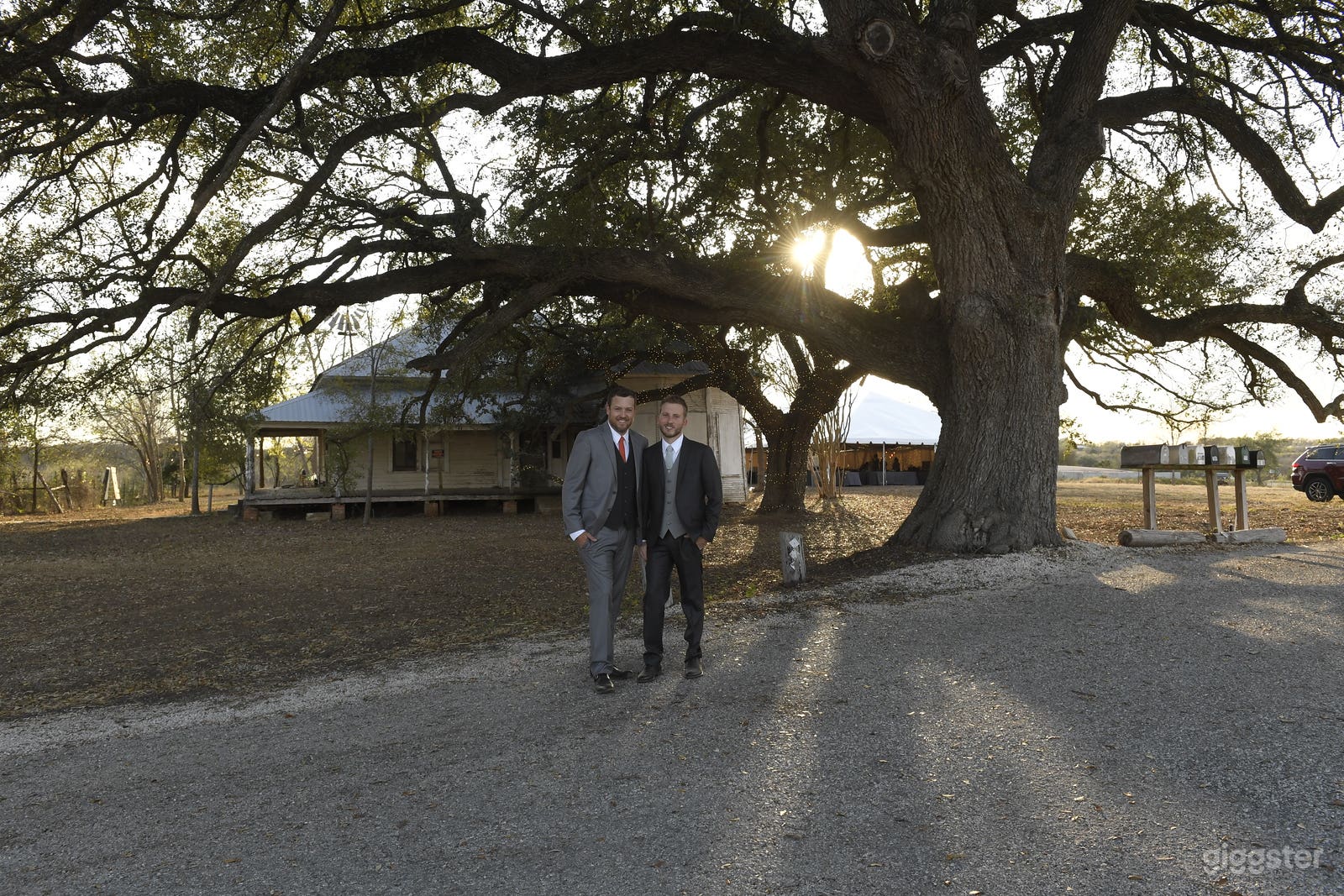 View from the street looking South at front of house. 