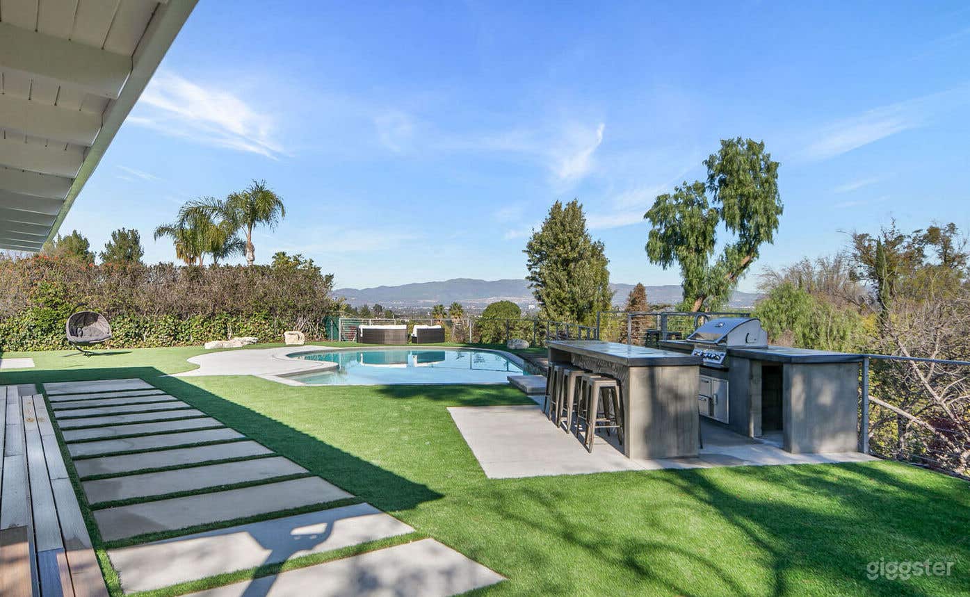 Pool with Stunning City View Photo 3