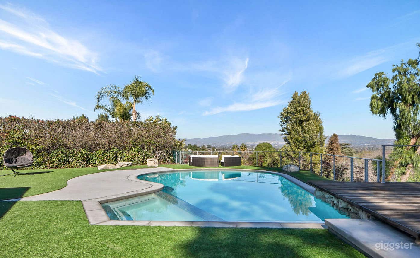 Pool with Stunning City View Photo 1