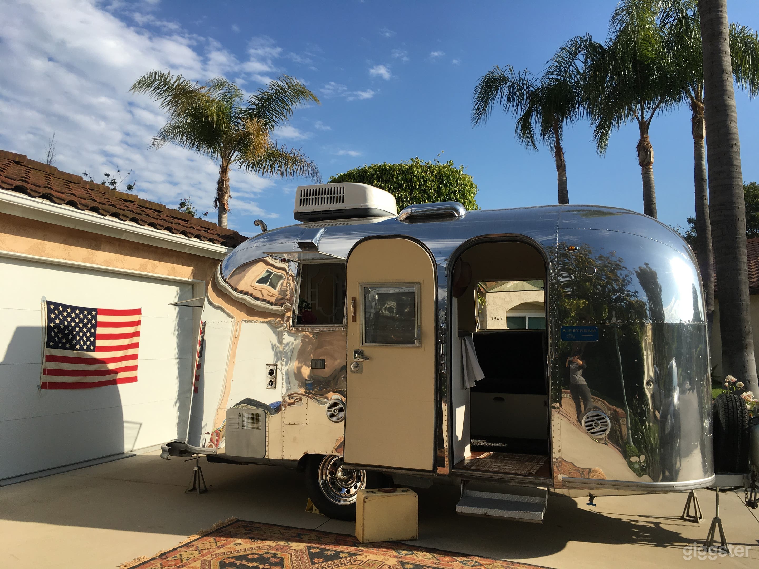 Rockin' 1965 Airstream Caravel super shiny on the outside, custom modern hollywood chic on the inside!