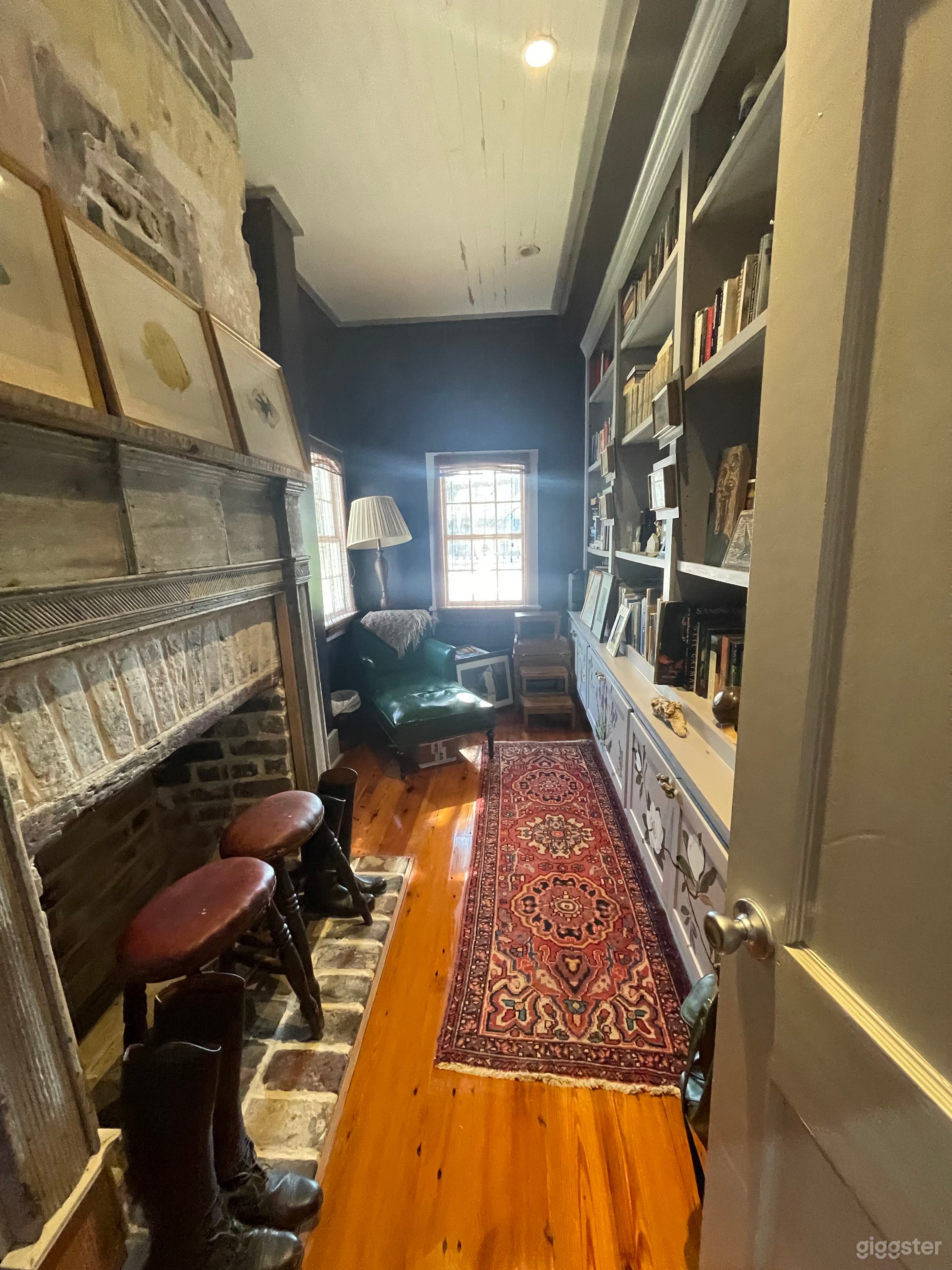 Library with federal-period mantel.