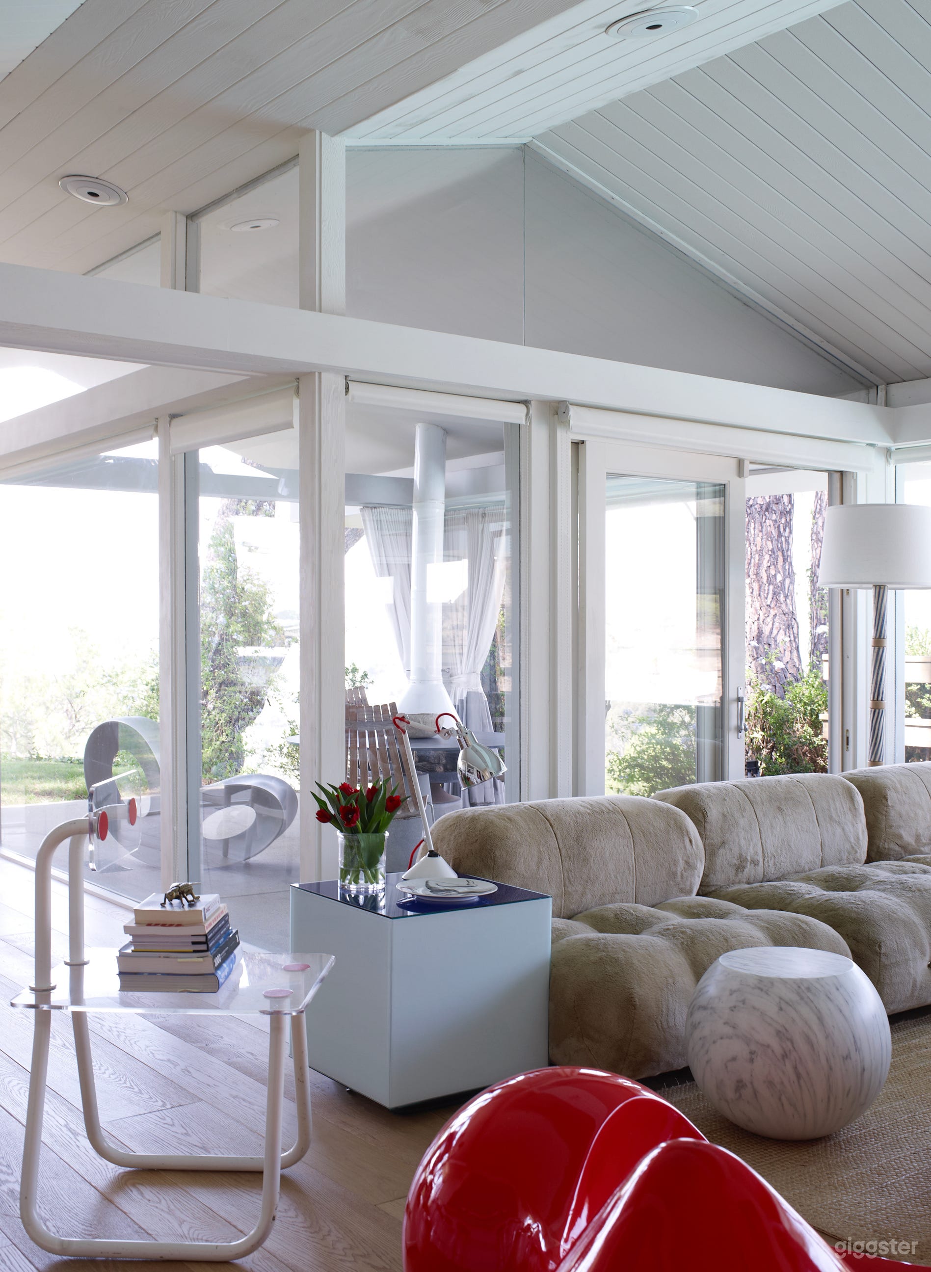 Living room looking out to exterior dining area.