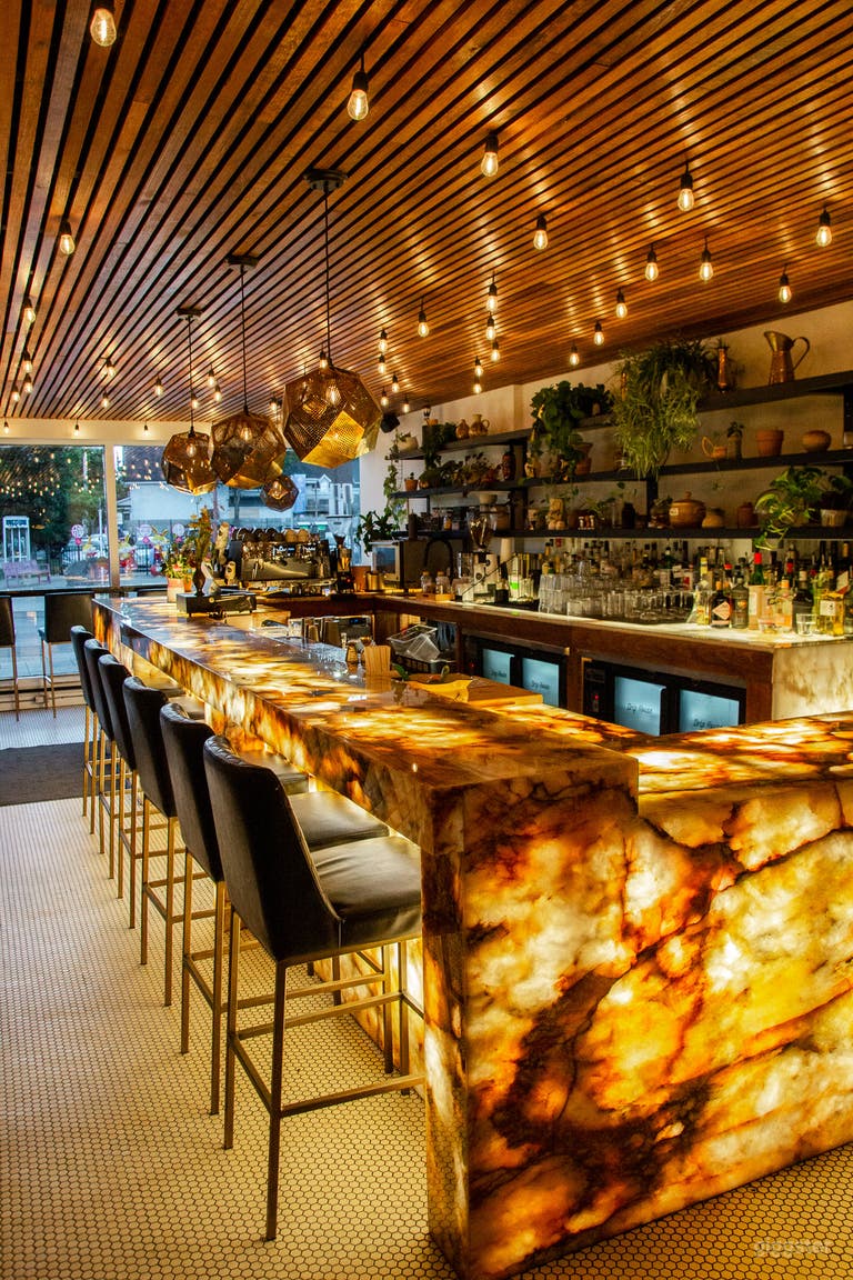  Versatile Cafe by Day, Stylish Cocktail Bar by Night 