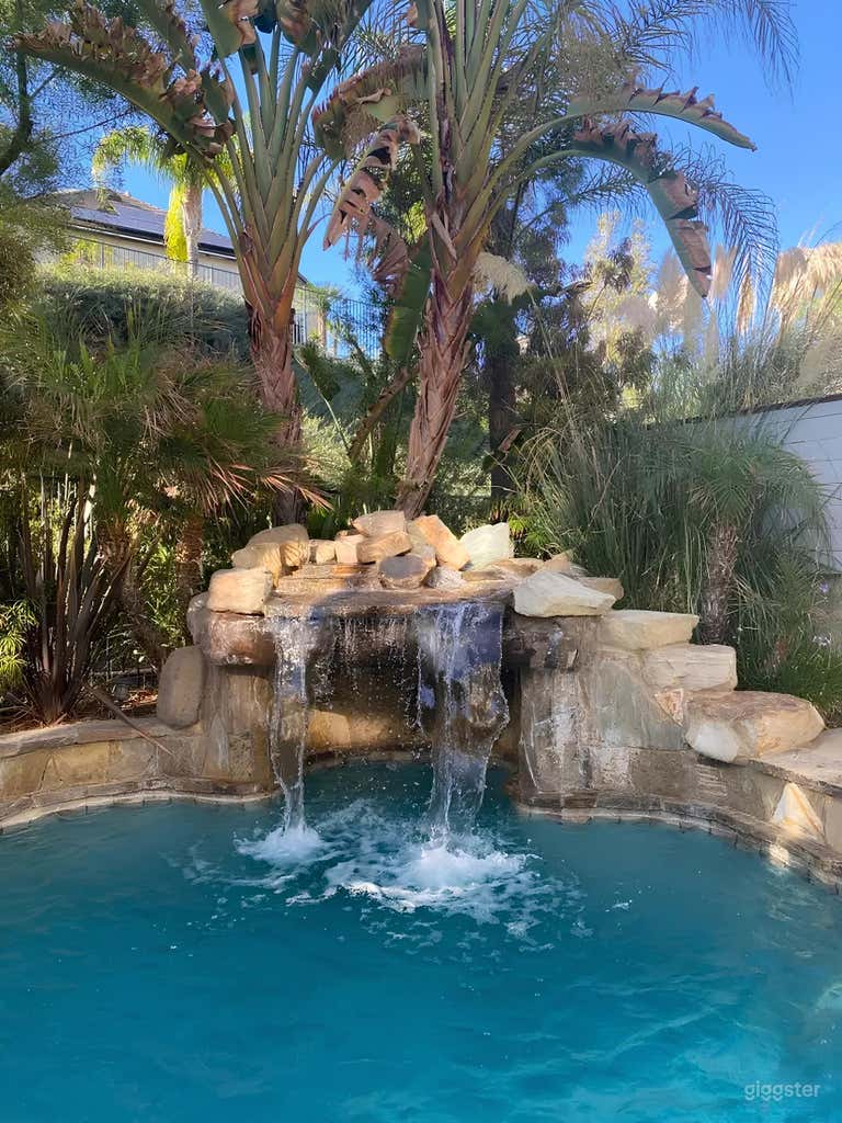  Tropical Backyard with Pool, Waterfall & Outdoor Lounge 