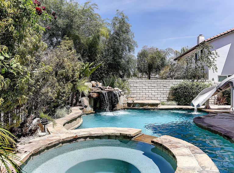  Tropical Backyard with Pool, Waterfall & Outdoor Lounge 